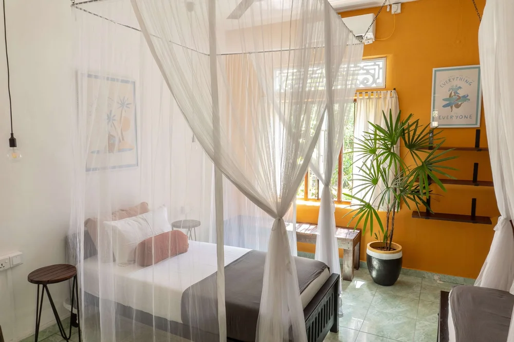 Twin share room with two single beds at Lotus, Ahangama