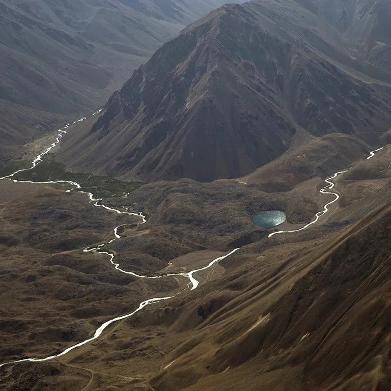 Bridging the gap: from project-scale decisions to system-scale planning for rivers and energy