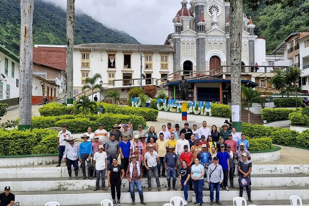 Group of coffee-growing families taking part in the Chorreritas hydropower sustainability programme in San Andrés de Cuerquia, Colombia.