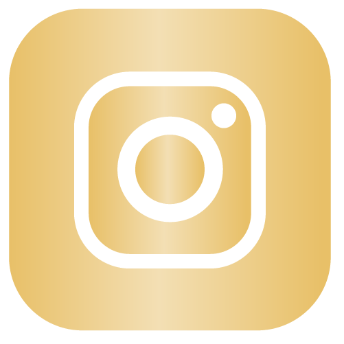 A gold rectangular object with rounded edges and a circular dial in the center.