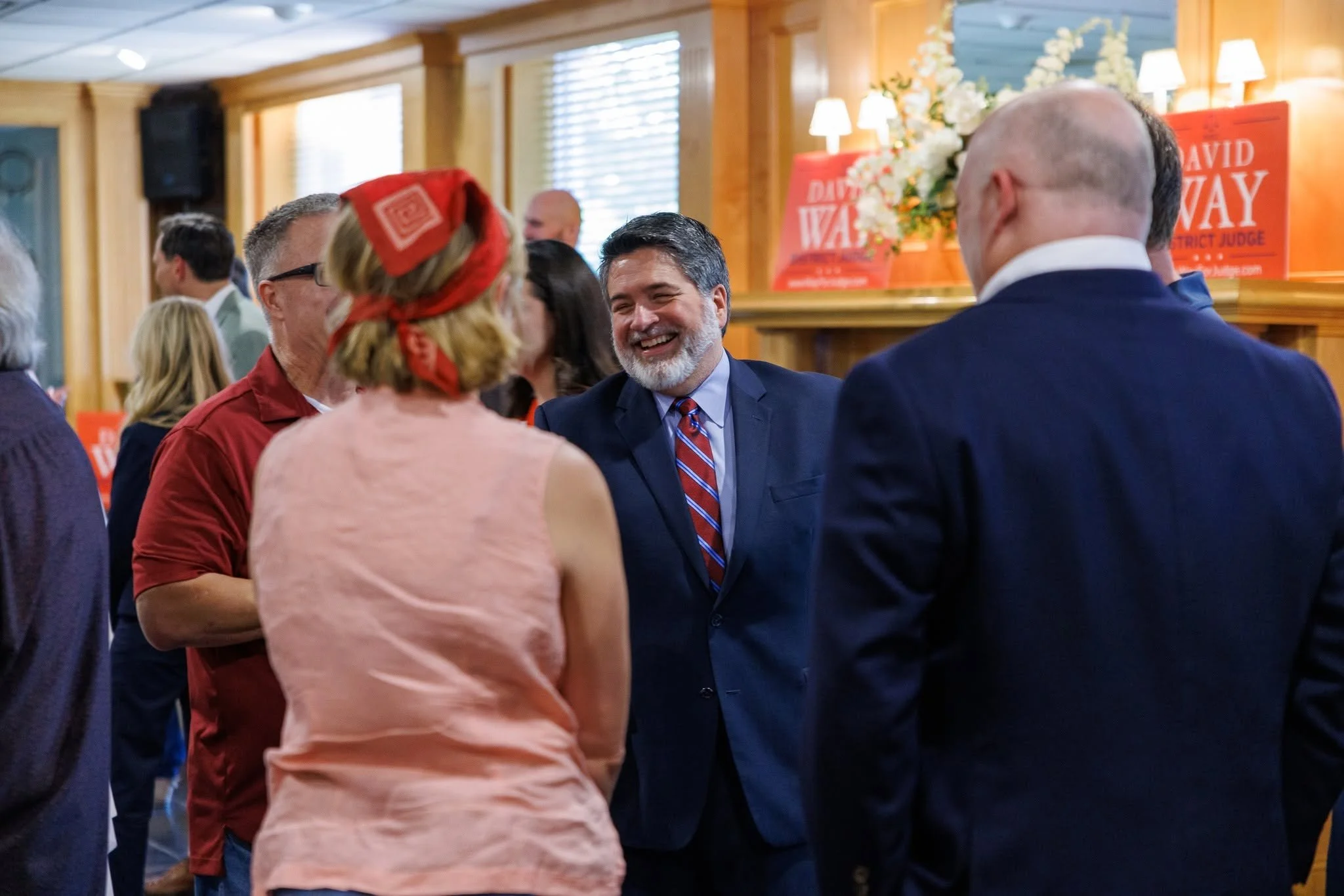 David Way shaking hands with enthusiastic supporters