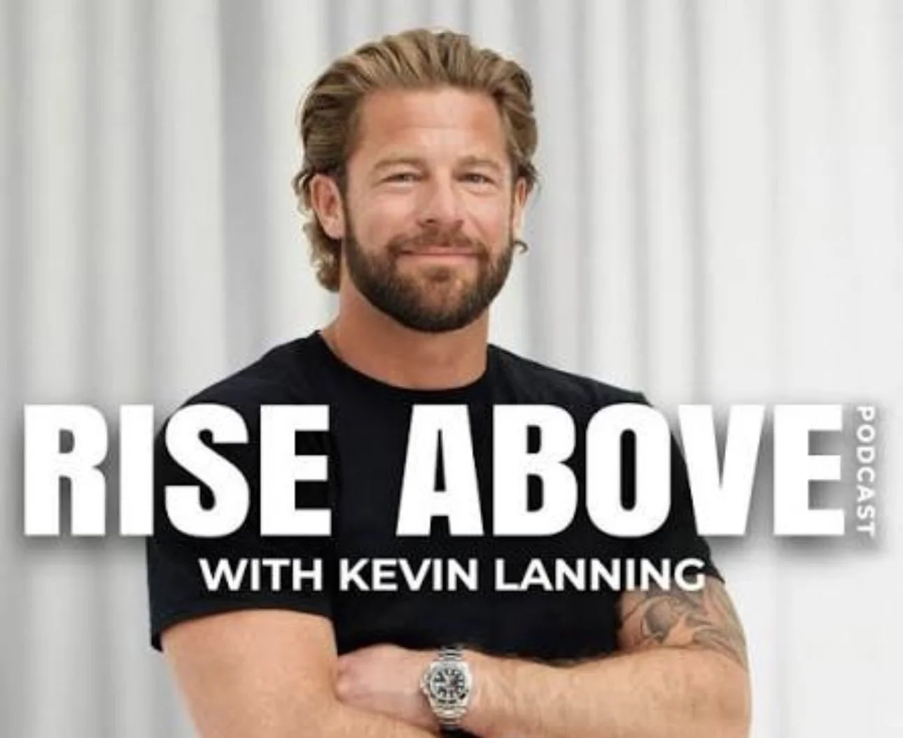 Kevin Lanning smiling with folded arms, wearing a black t-shirt and a watch, in front of a light-colored curtain, promoting the podcast titled "Rise Above".