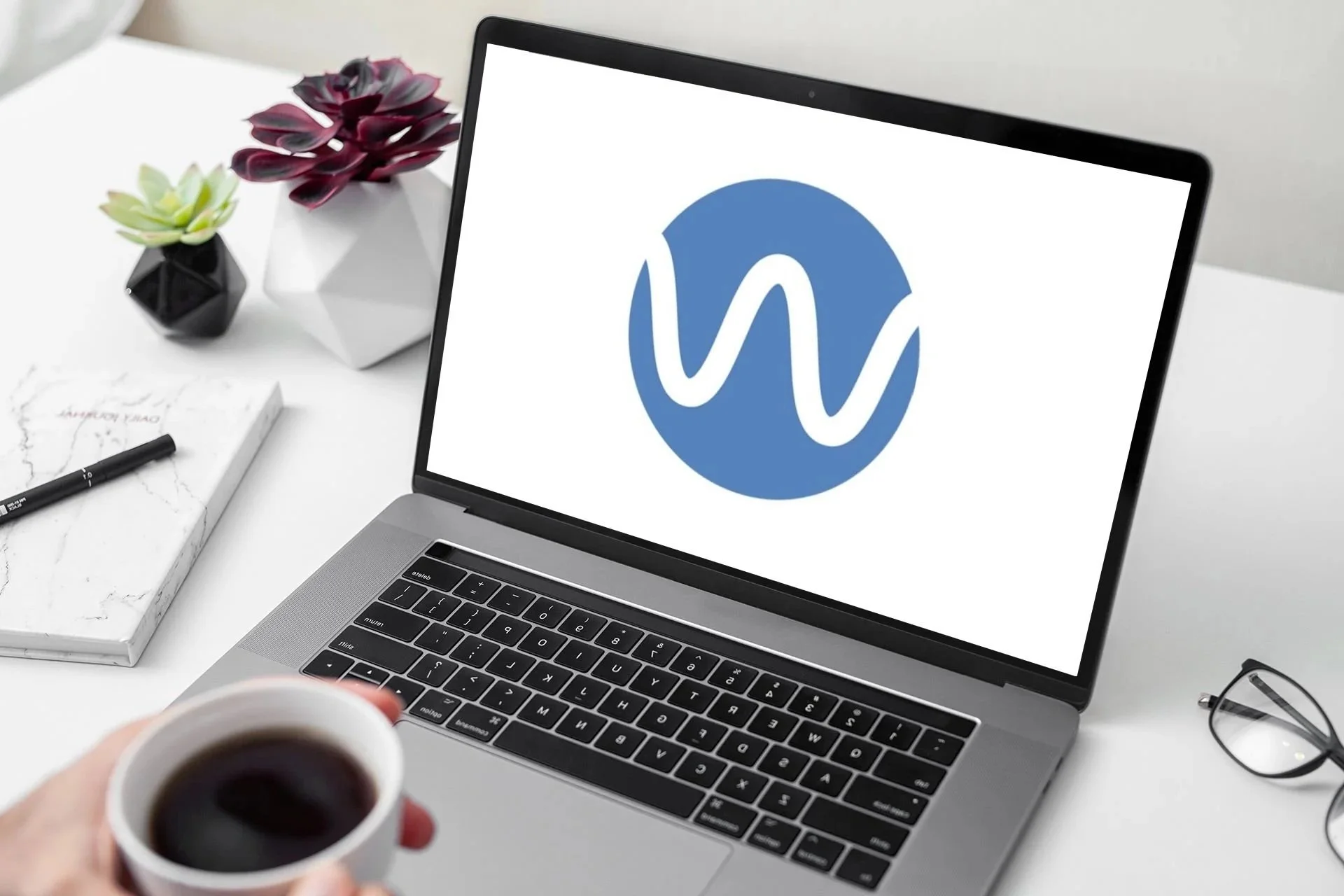 The WAVE logo, a blue circle with a white "W."