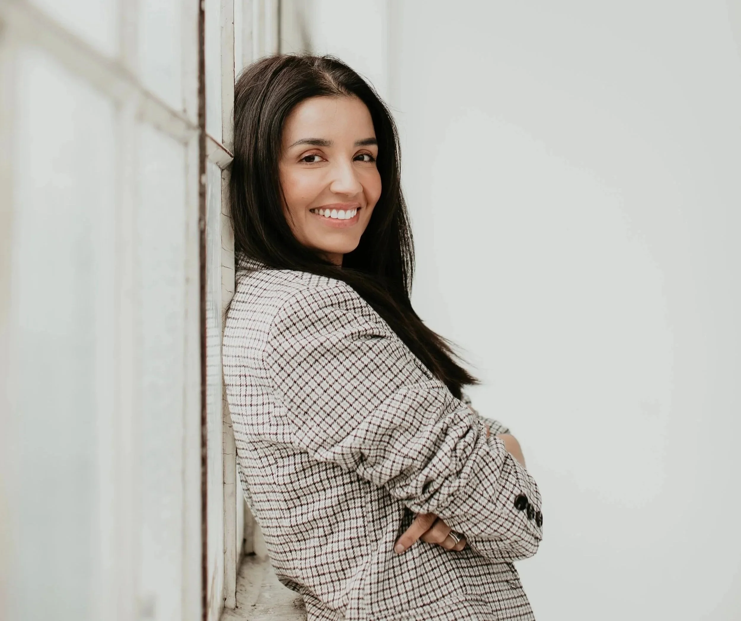 Simi Kennedy ARNP CRNA founder of Sona Medical Aesthetics smiling in a professional portrait Newcastle WA