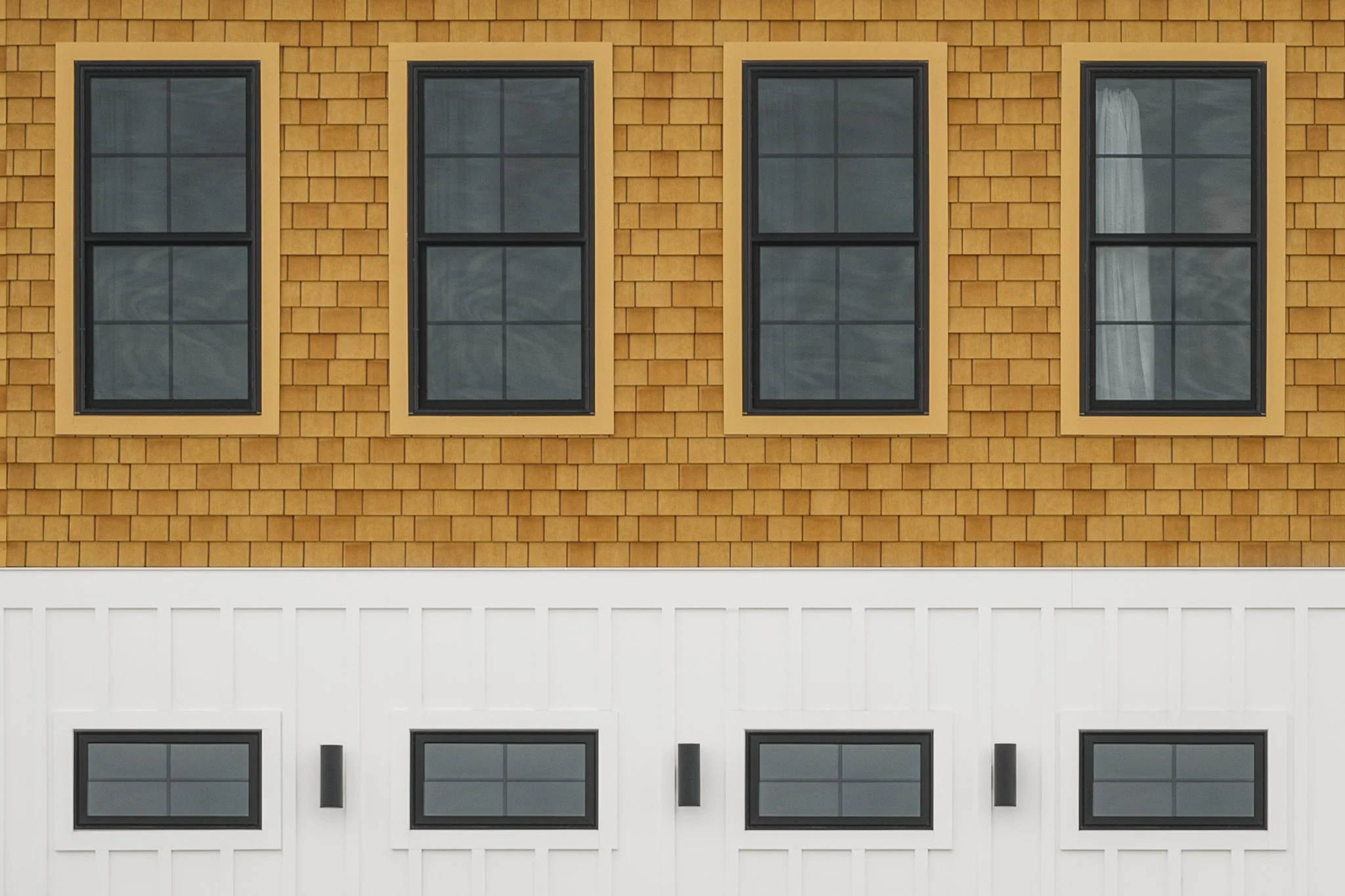 exterior facade detail showing differences in materiality