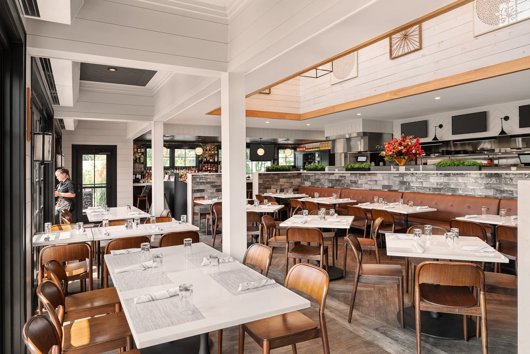 Bright dining room at 745 Osteria, designed by Point One Architects in Old Saybrook, CT.