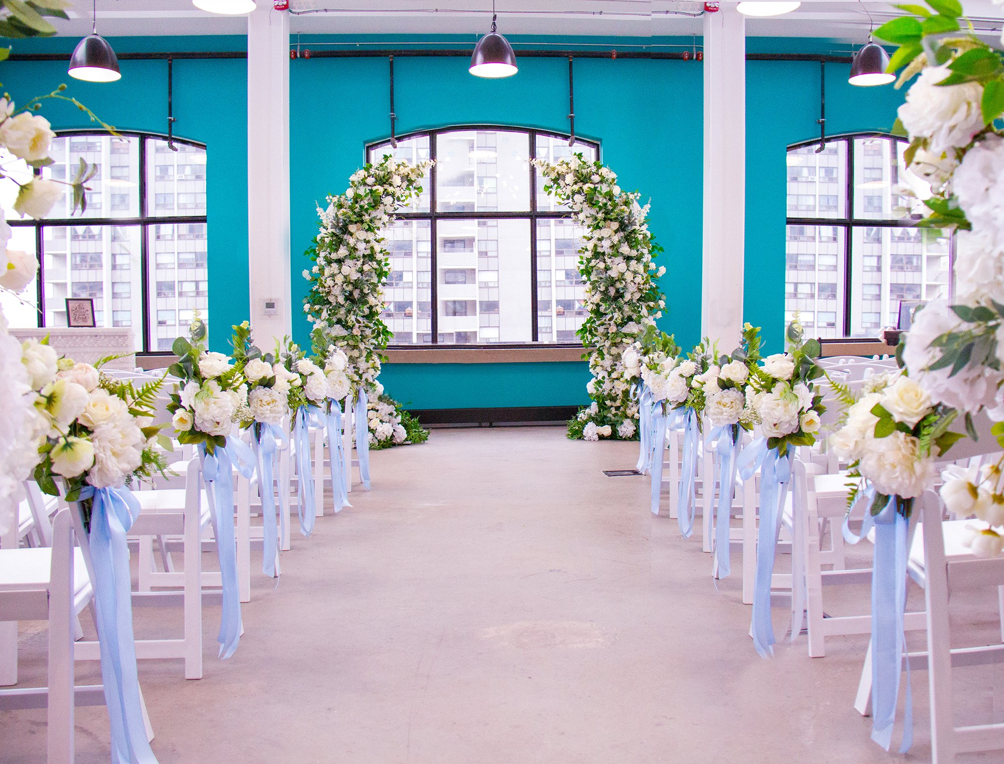 Transform your dining table into a vision of elegance with a stunning floral and candle arrangement, creating a captivating ambiance that enchants and delights.