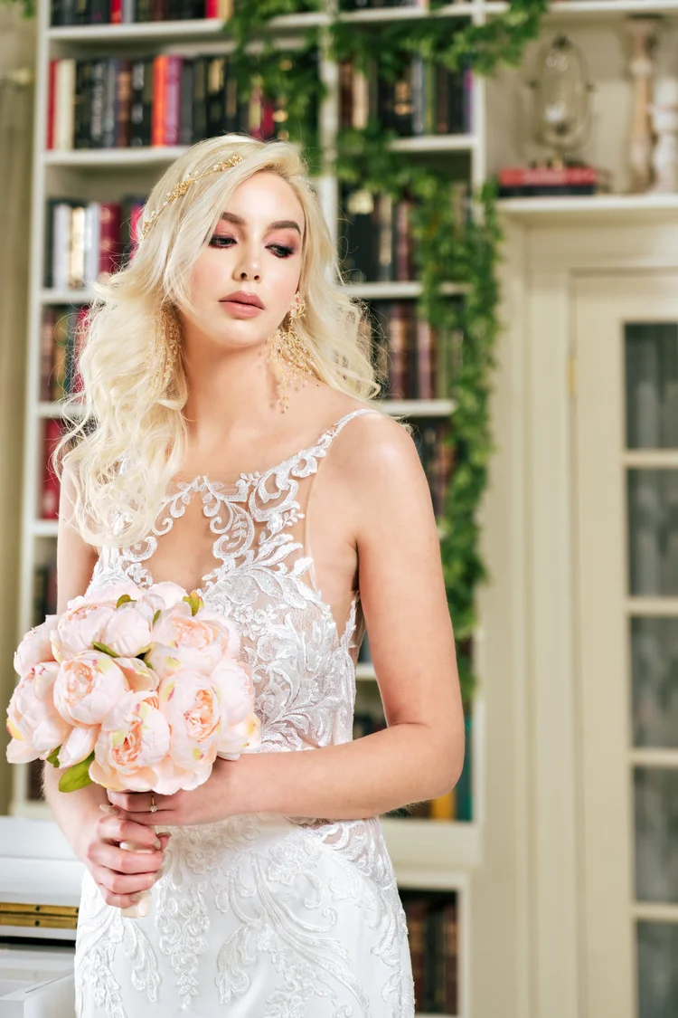 Bride with candelabra and floral mantel