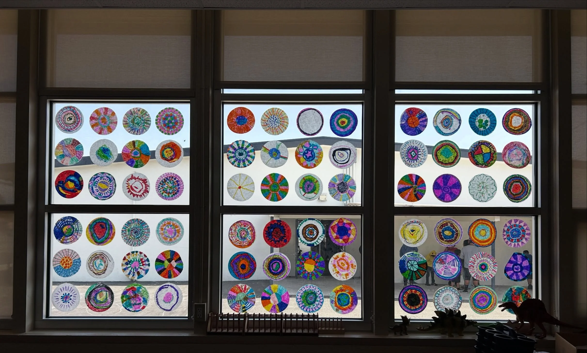 Check out some recent artwork from our Mixed Media program, led by our awesome Teaching Artist, Betty Pham!

To celebrate Hispanic Heritage Month, our students learned how to make papel picado, a traditional Mexican craft. Students folded and cut tis