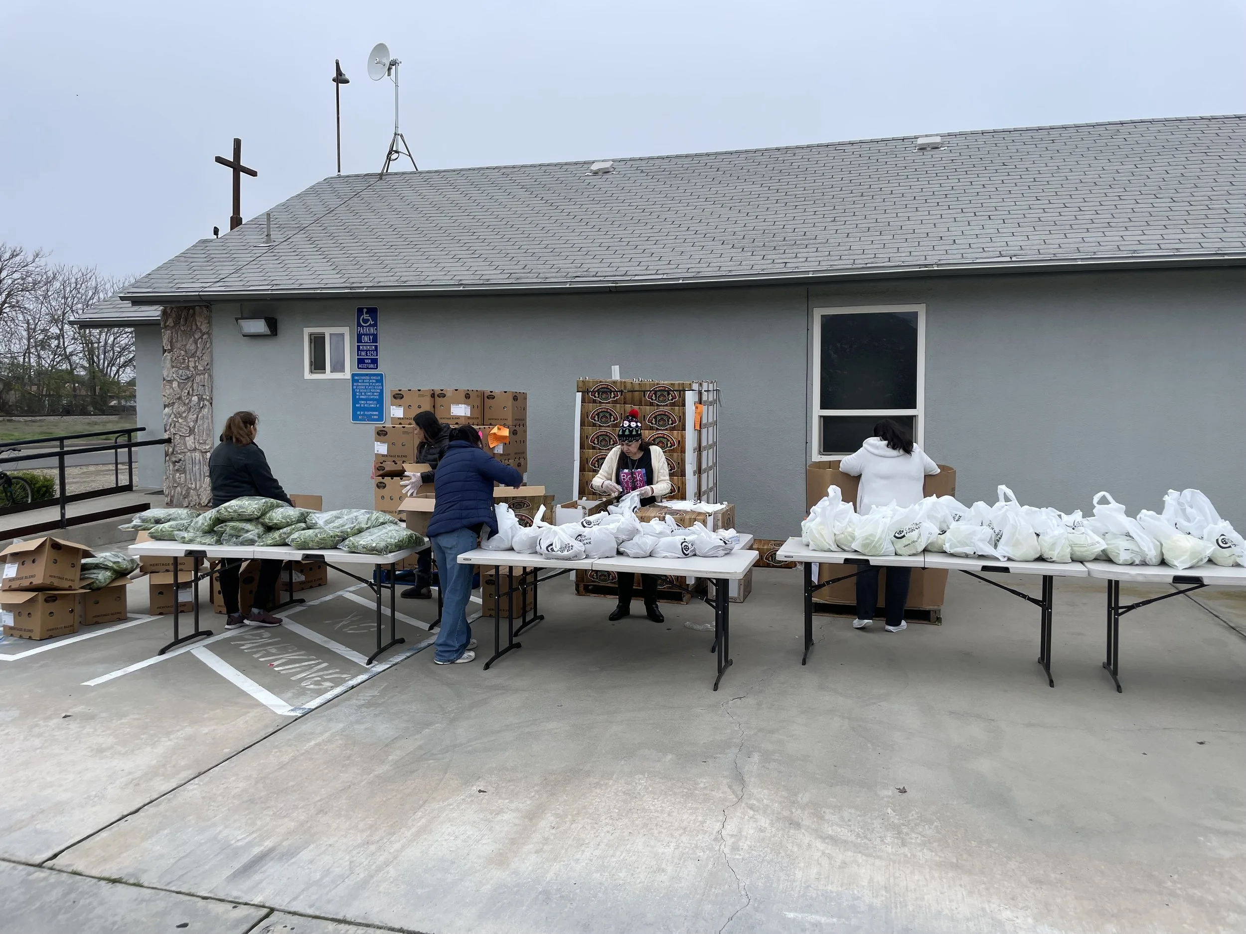 volunteers at food day giveaway.jpg