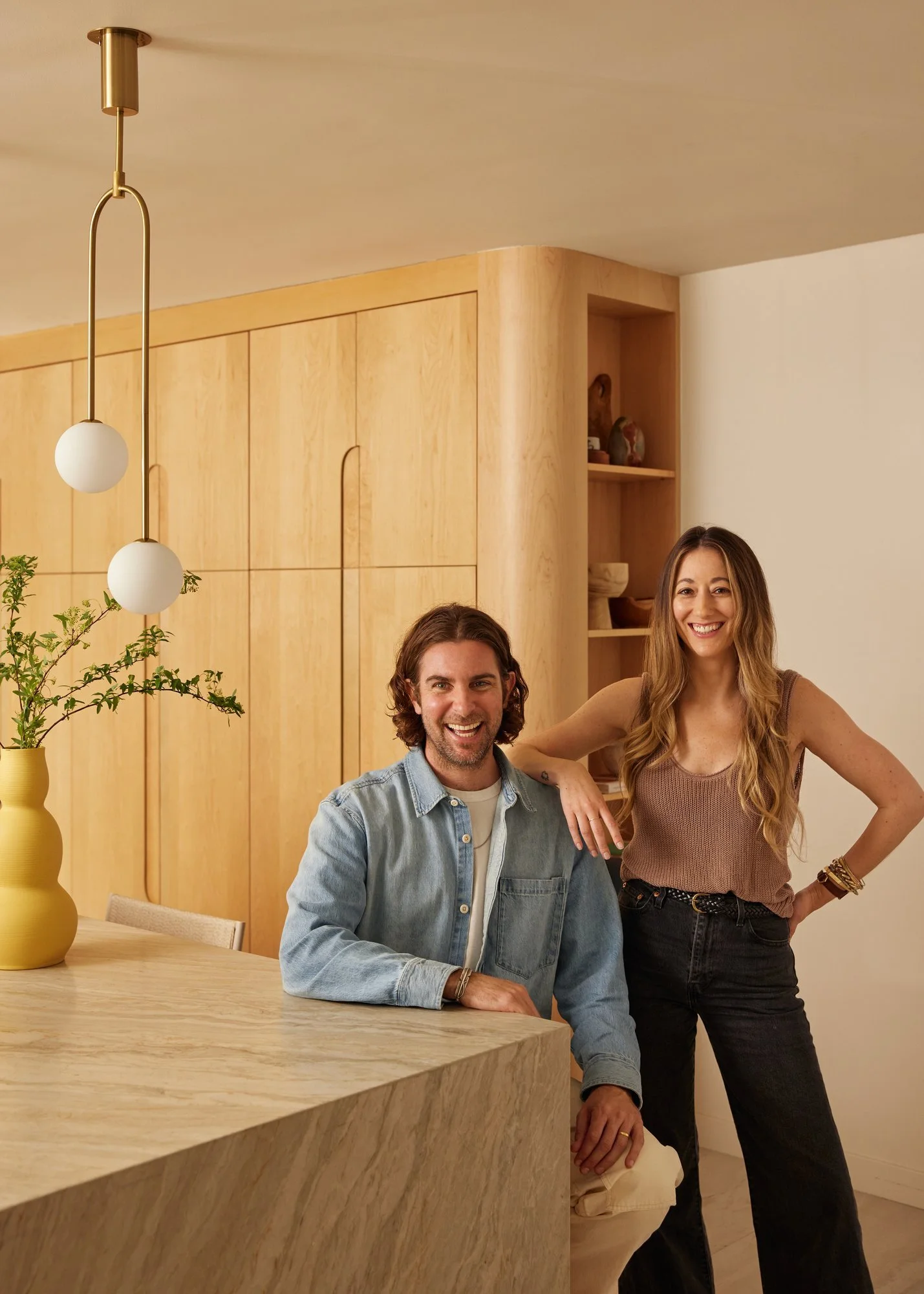 Shawn and Tina Taylor owners of Dacotah studio standing in a home that was remodeled in Pasadena