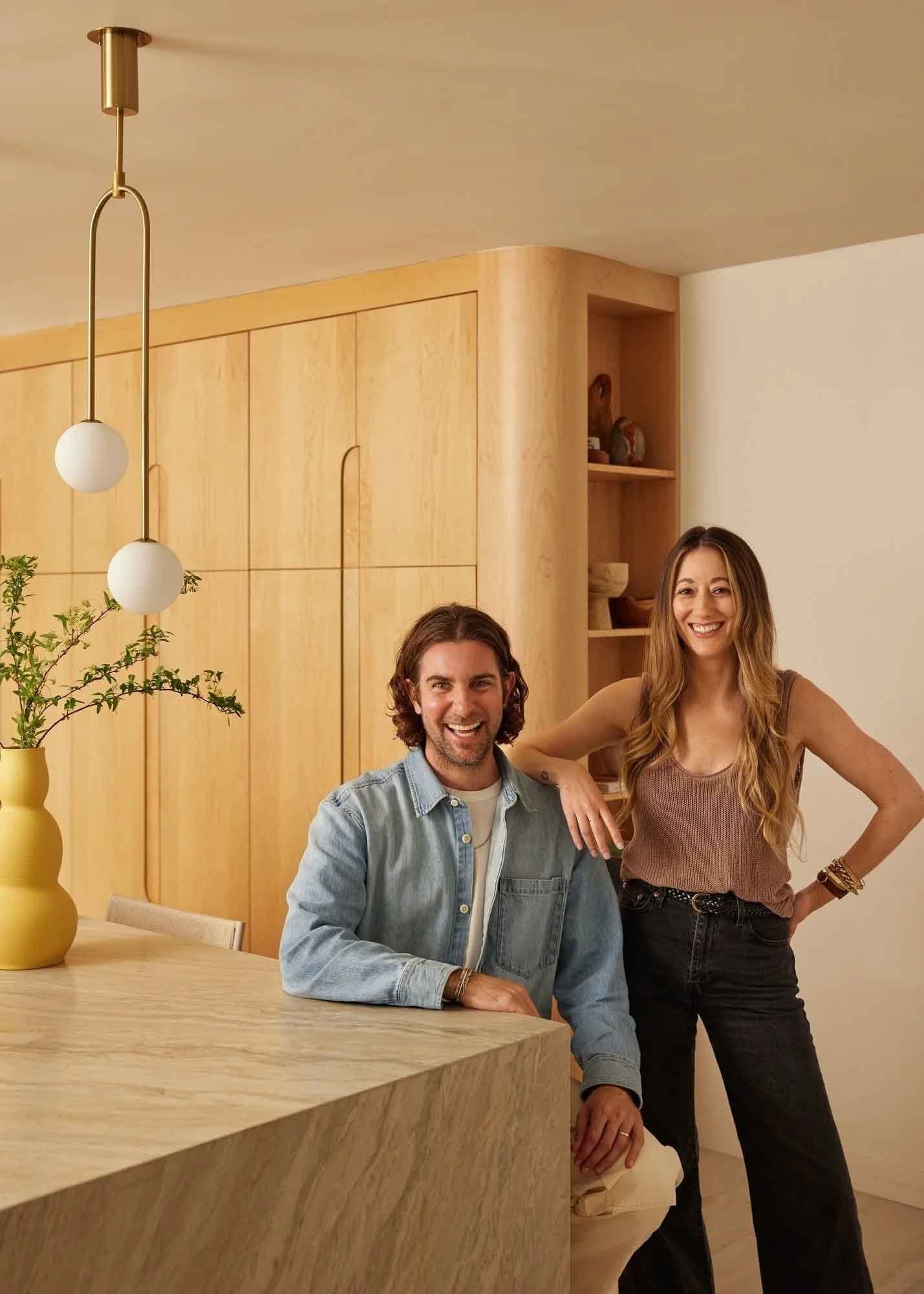 Sean and Christina standing in a recently remodeled kitchen in Pasadena.