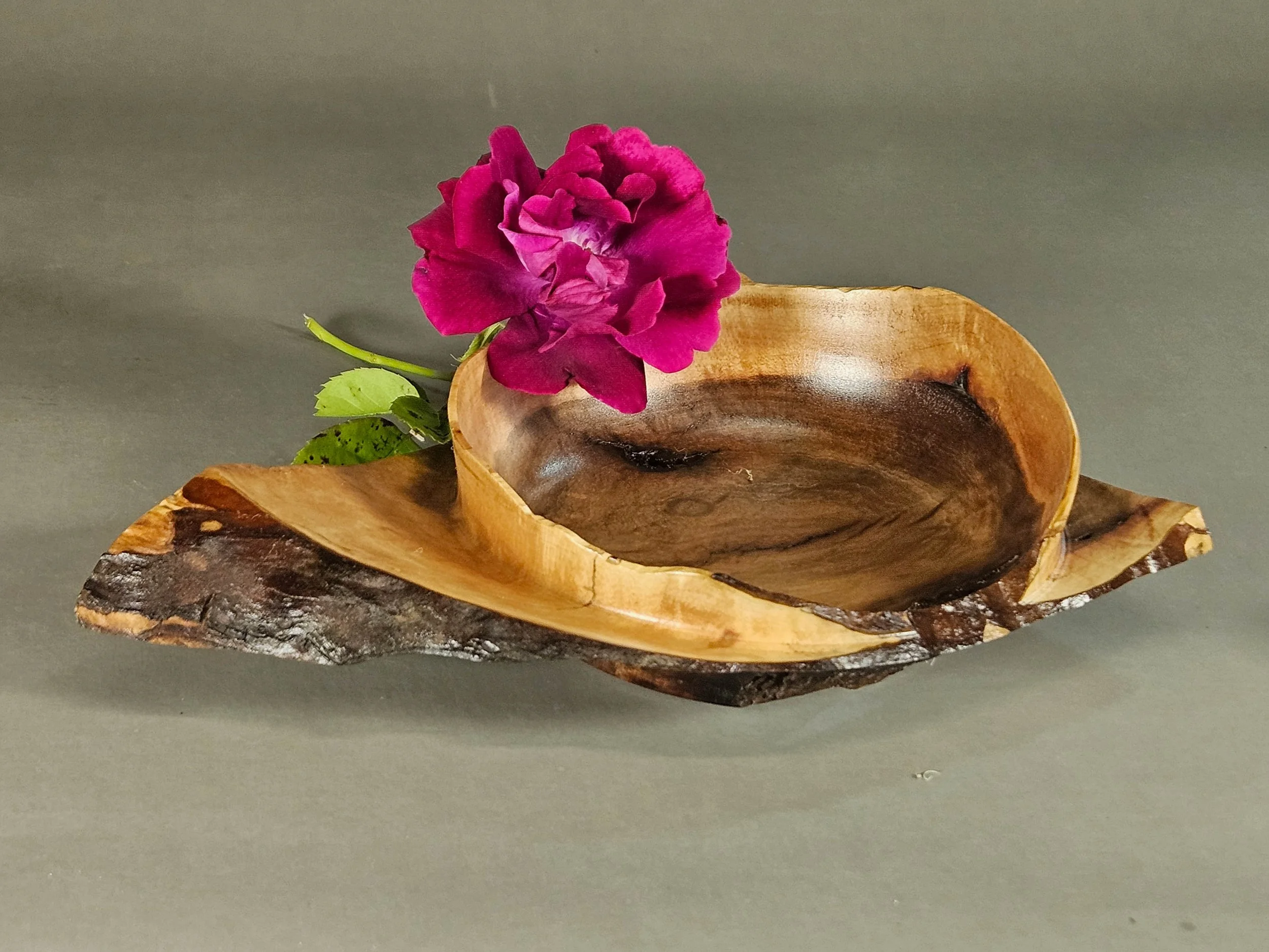 Irregular shaped 'square' Madrone bowl - This sculptural bowl is turned from a rustic piece of a salvaged old Madrone tree. In a process that honors the wood's natural character, preserving its unique, asymmetric shape. The final form retains its ori