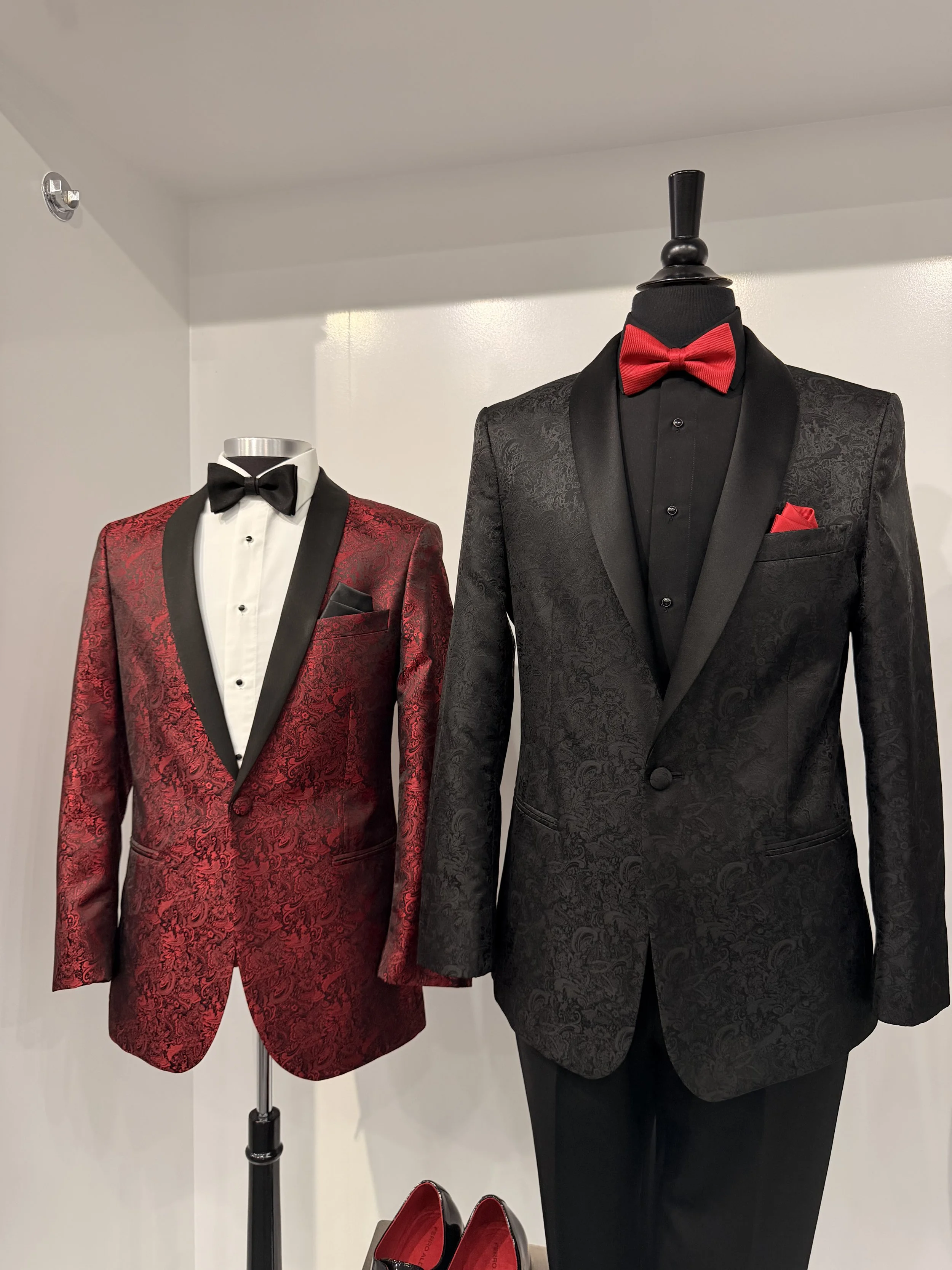 Two slim fit prom tuxedos side by side at The Tux Guys in North Bergen NJ