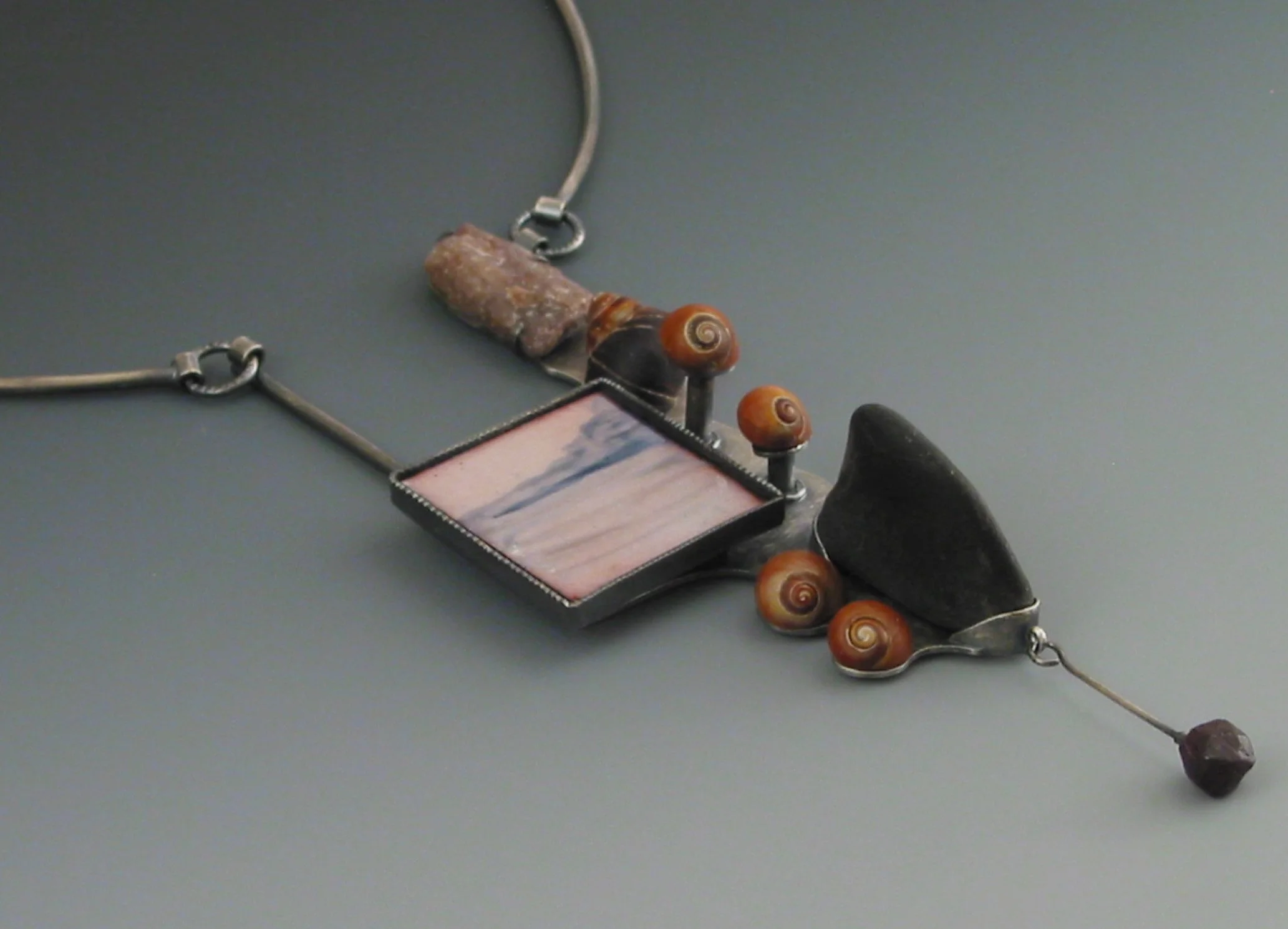 MAINE   |   enamel, periwinkles, beach stones, shell fragments, garnet, silver