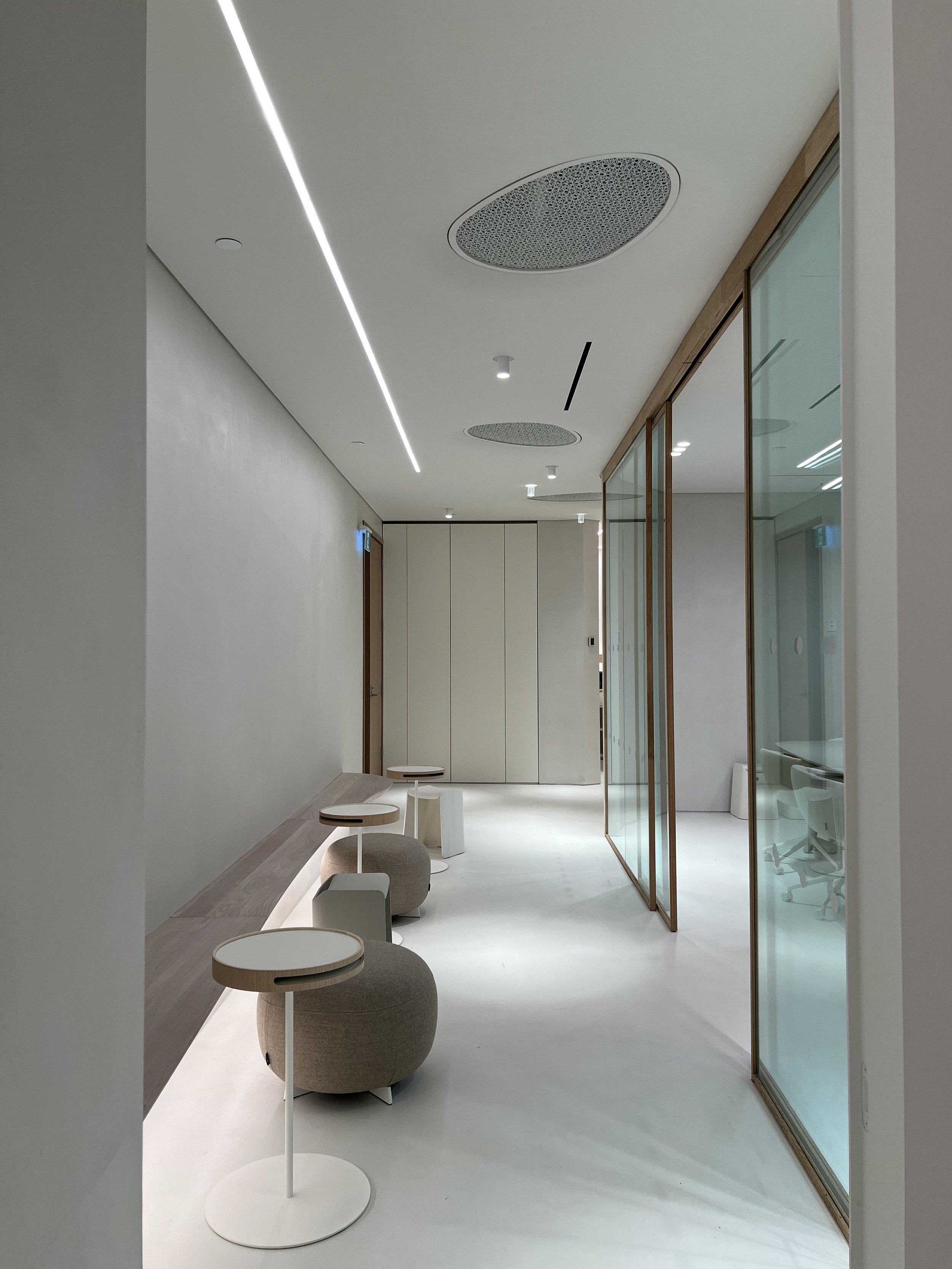 Foyer | Built-in seating along the walls or pull-out bench seating can adapt the space for hybrid sitters who need a versatile workstation.