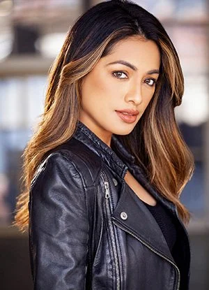 Acting Headshot wearing a black leather jacket.