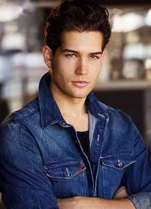 Acting Headshot looking confidently at the camera.