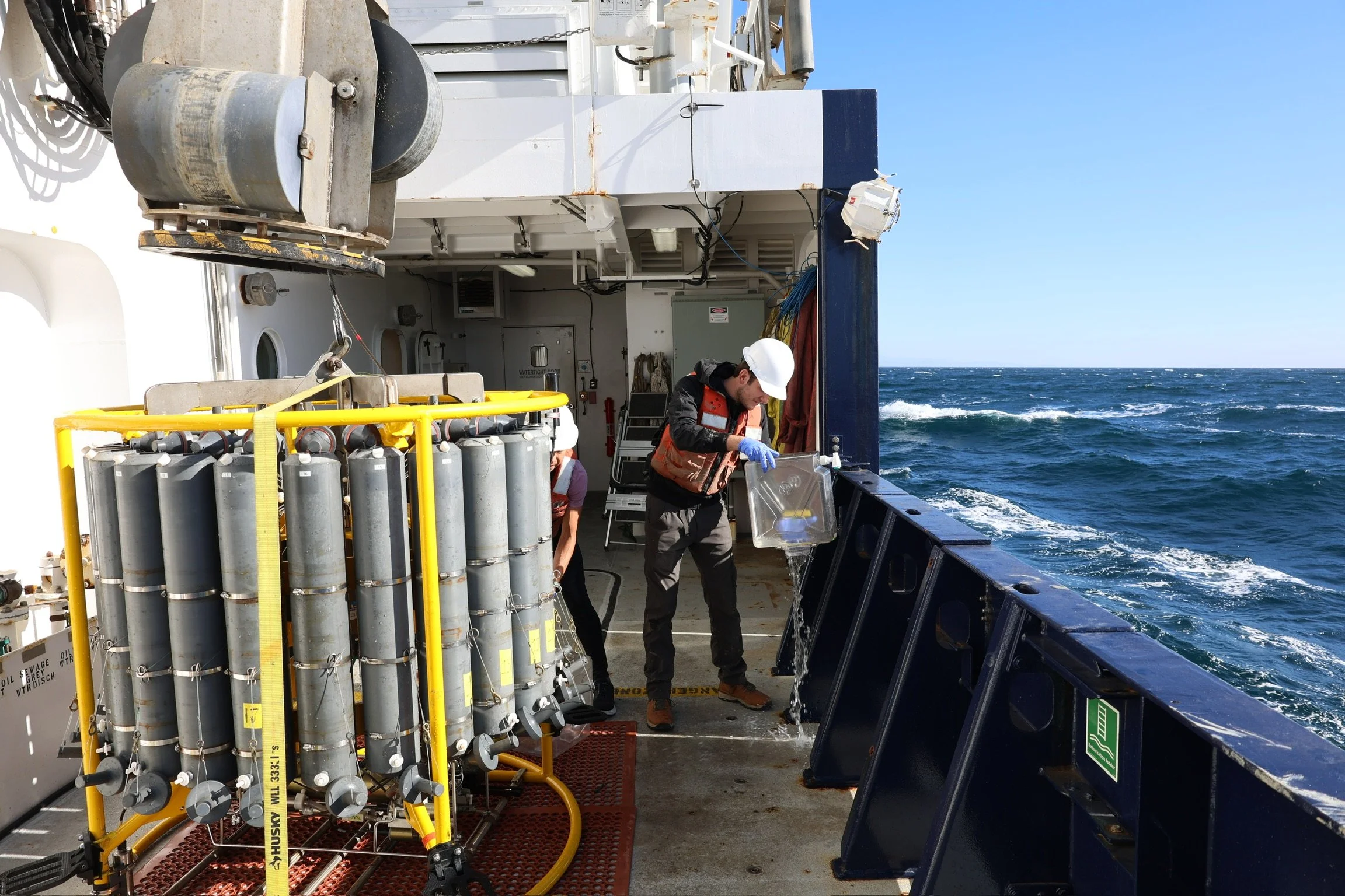 Preparing a CTD on R/V Sally Ride during SR2422 (Ancient California Ecosystems and Shorelines)