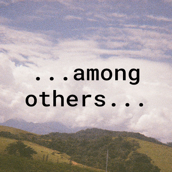 Landscape with rolling hills and cloudy sky, with text saying '... among others...'