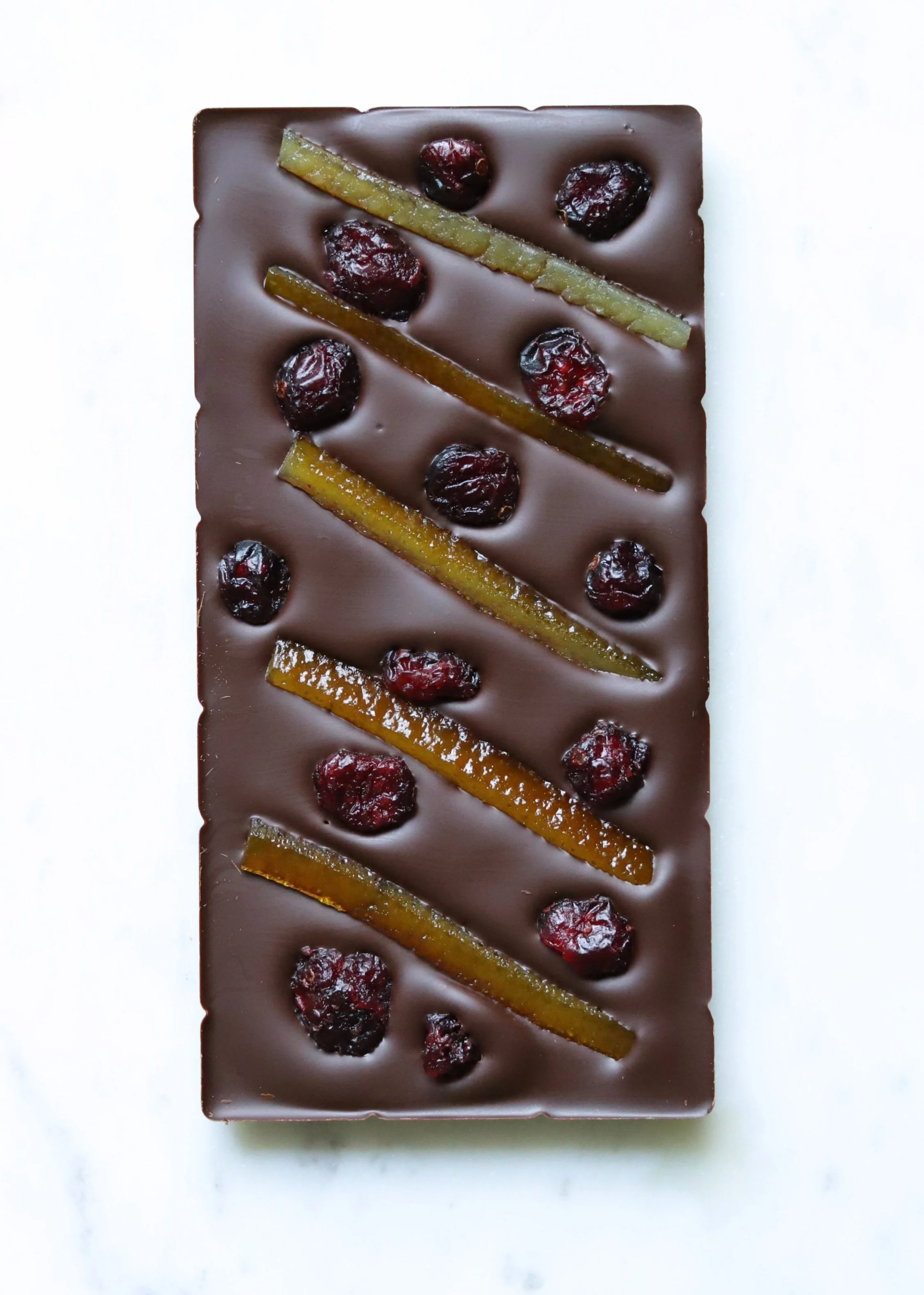 orange confit and cranberry luxury dark chocolate bar valrhona