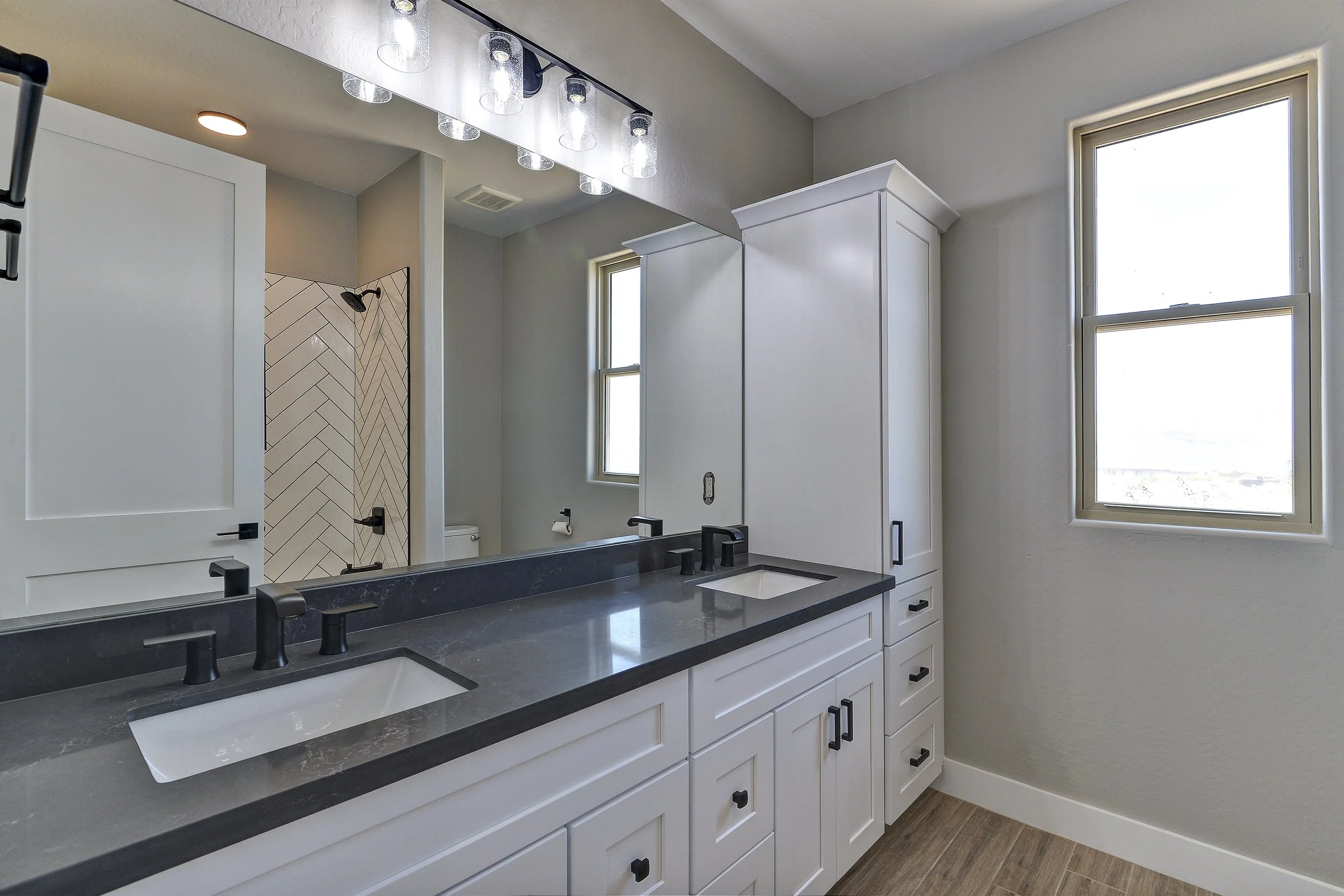 Modern luxury custom home in Scottsdale Arizona with clean lines, large windows, and desert landscape.