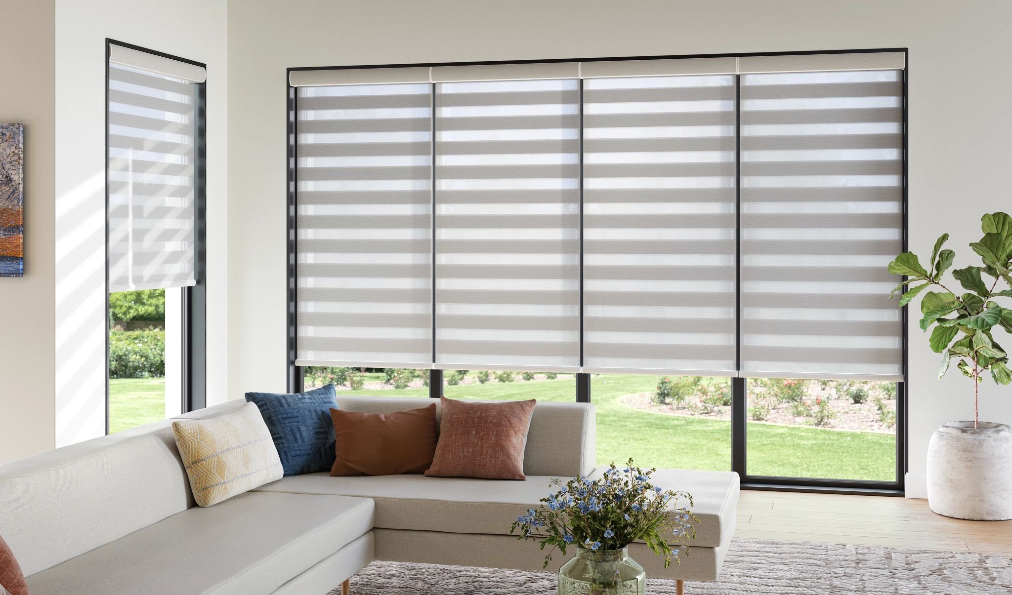 Motorized Banded Zebra shades covering door in Conroe, TX.
