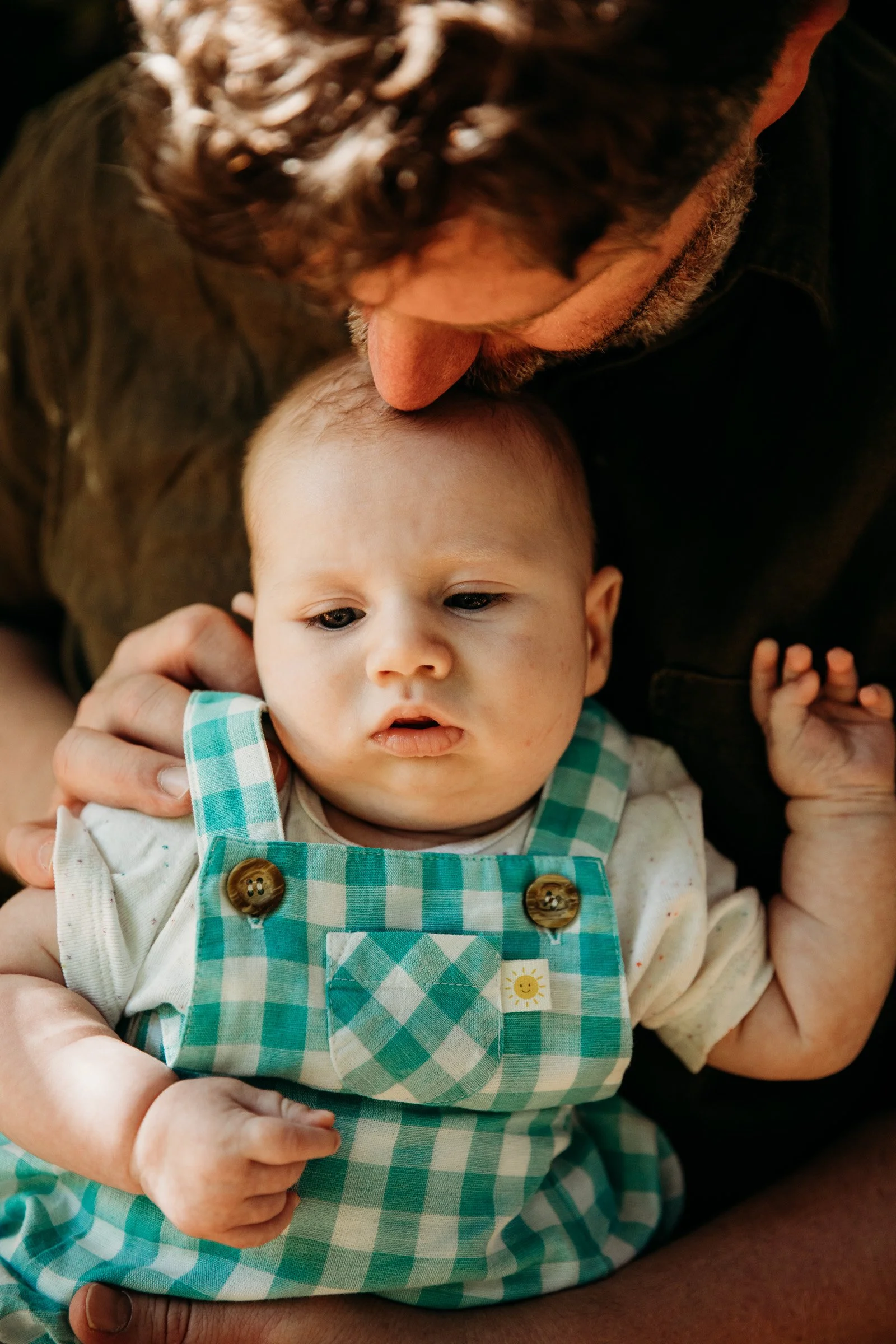 adelaide-family-photographer-father-baby-kiss.jpg