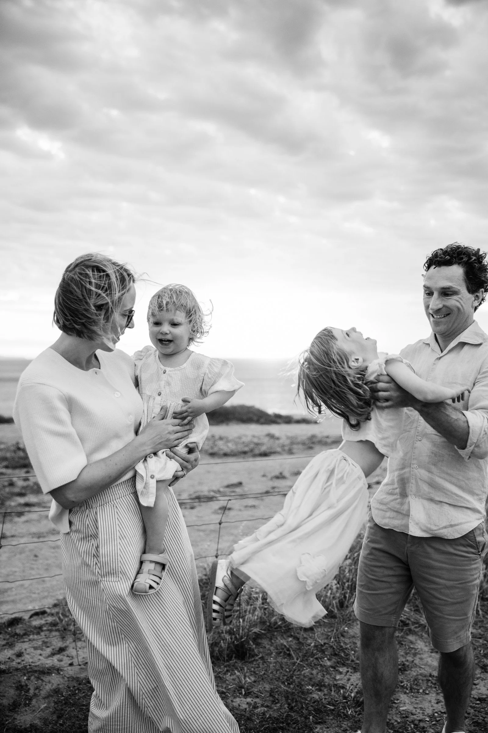 adelaide-family-photographer-family-laughing-coast.jpg