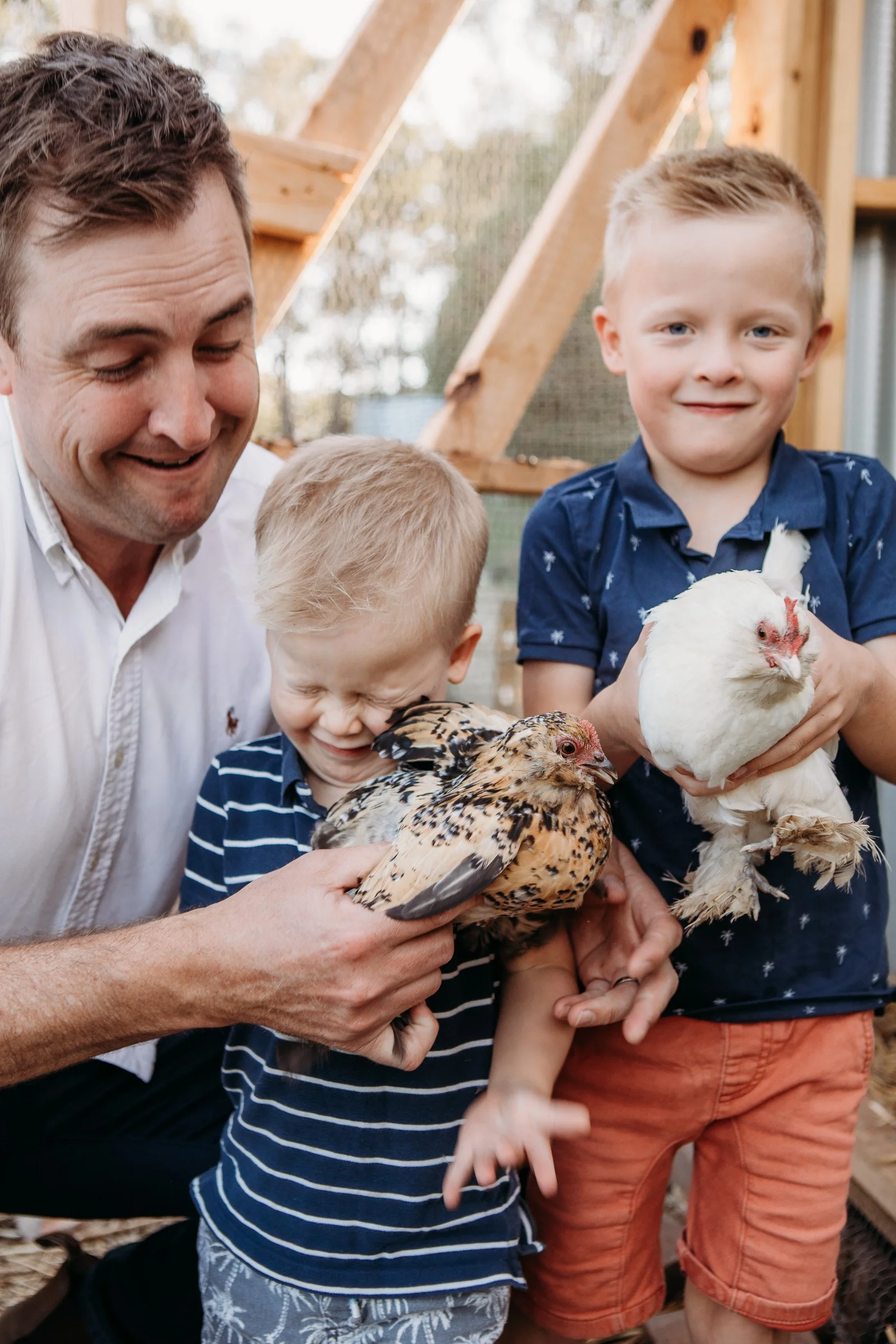 adelaide-family-photographer-family-boys-with-chickens.jpg