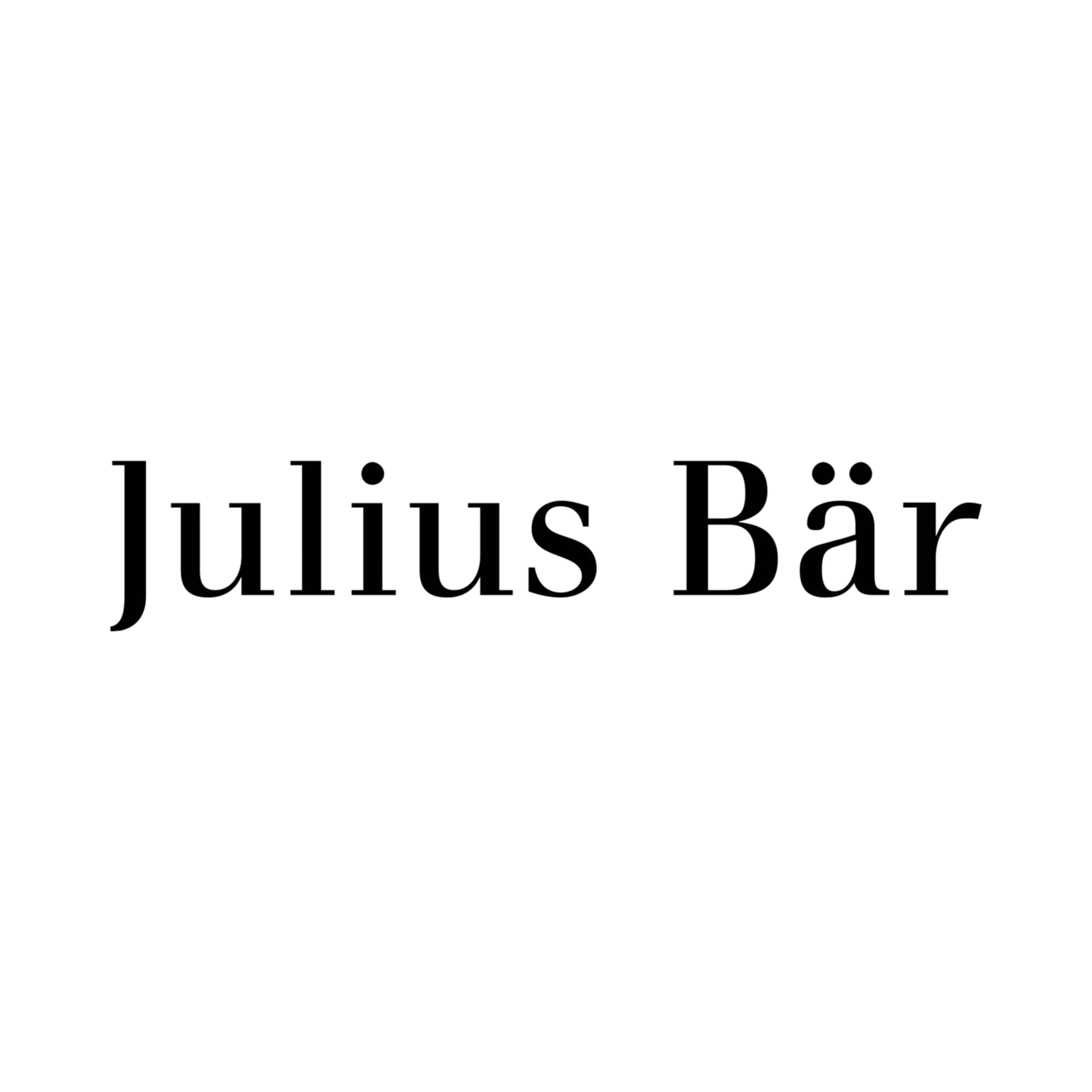 Close-up of a sign that reads 'Julius Kör' in black text on a white background.