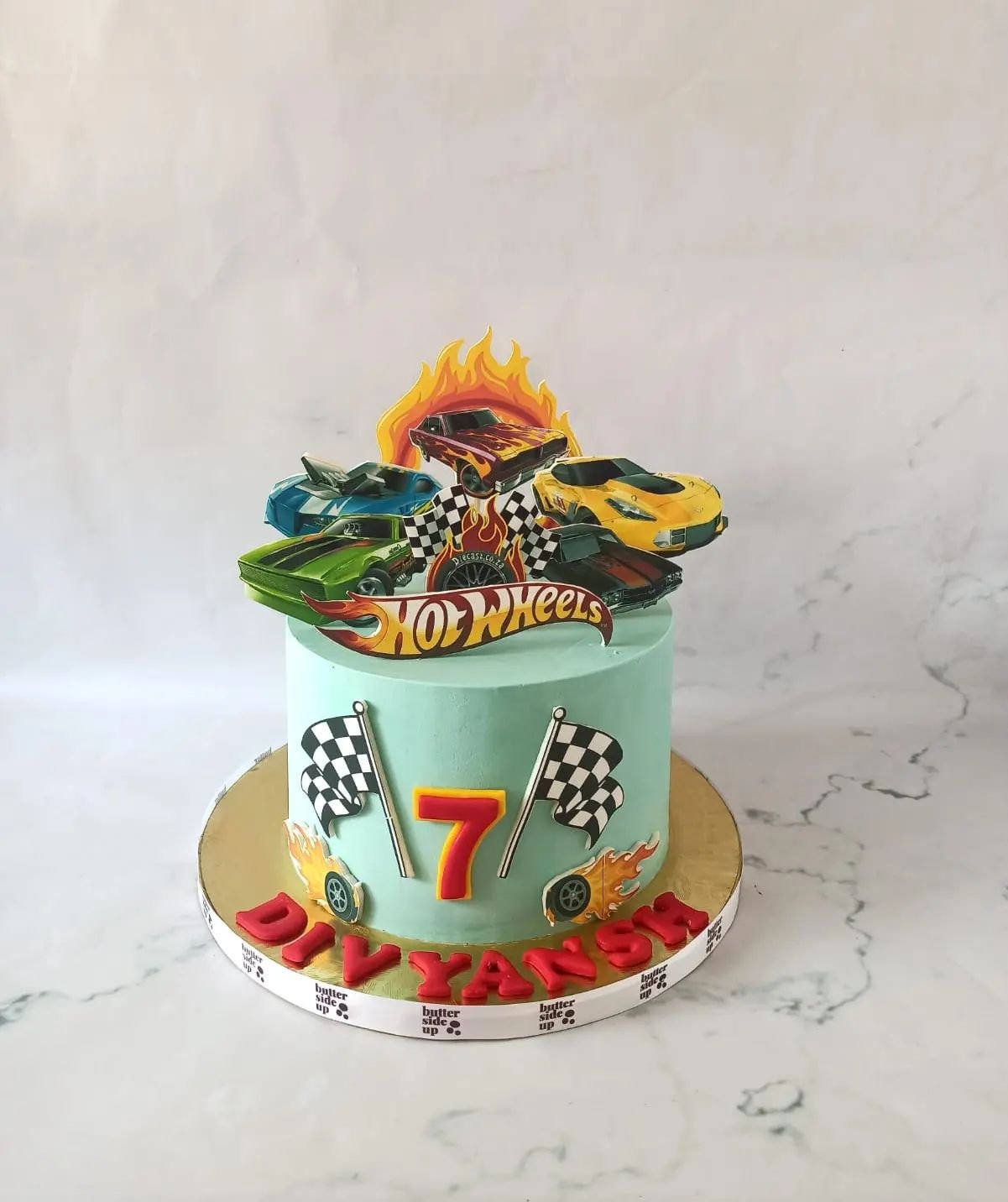 Hotwheels cake made with edible prints

[Hot Wheels, buttercream cake, seventh birthday, bangalore, customised cakes bangalore]