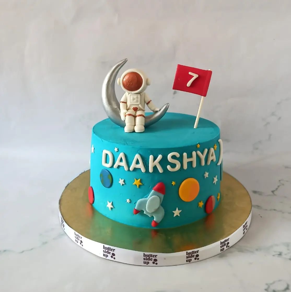 Space themed cake

[Astronaut, moon landing, customized cakes Bangalore]