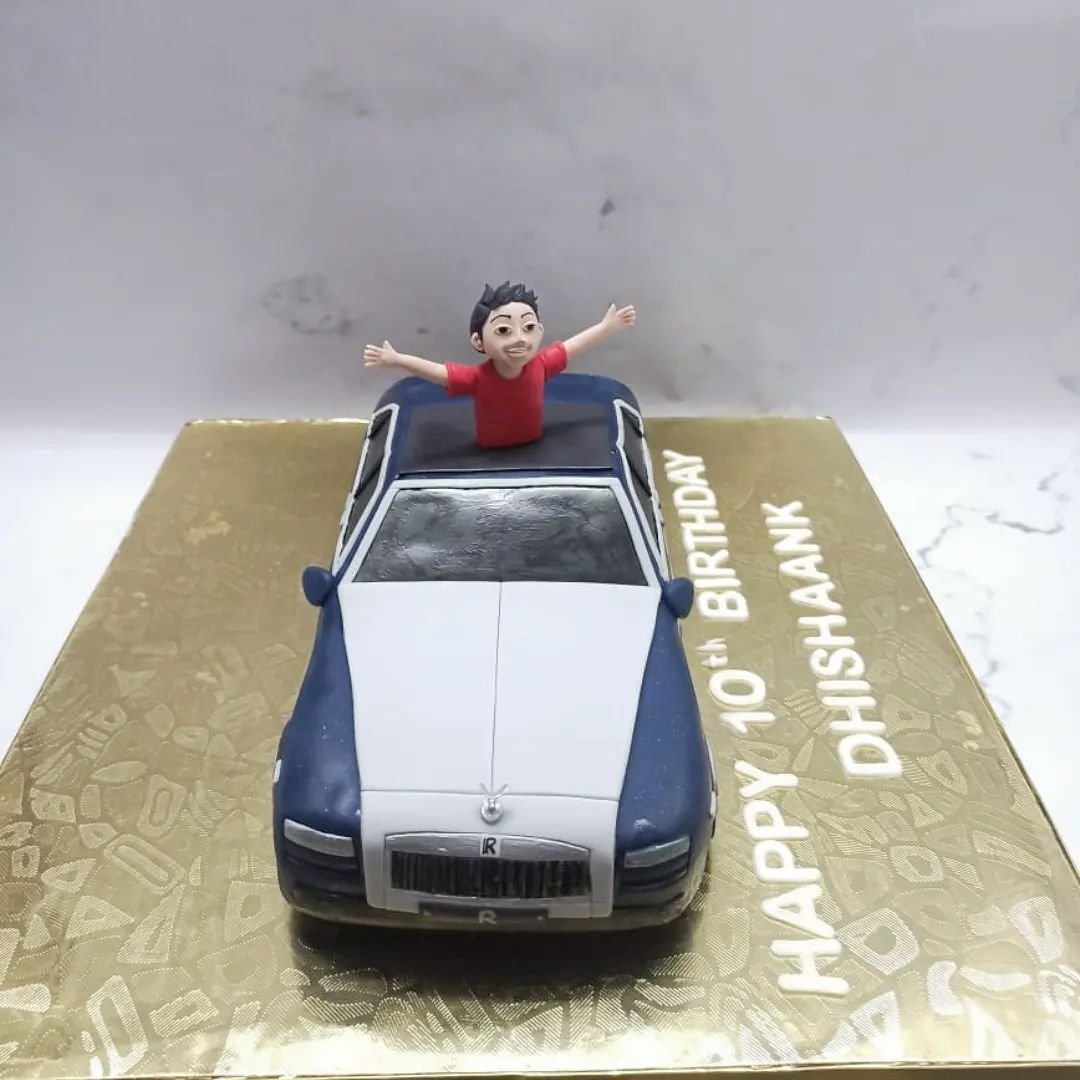 Boy in a Rolls Royce

Car shaped cake, summer vacation fun, customised cake bangalore