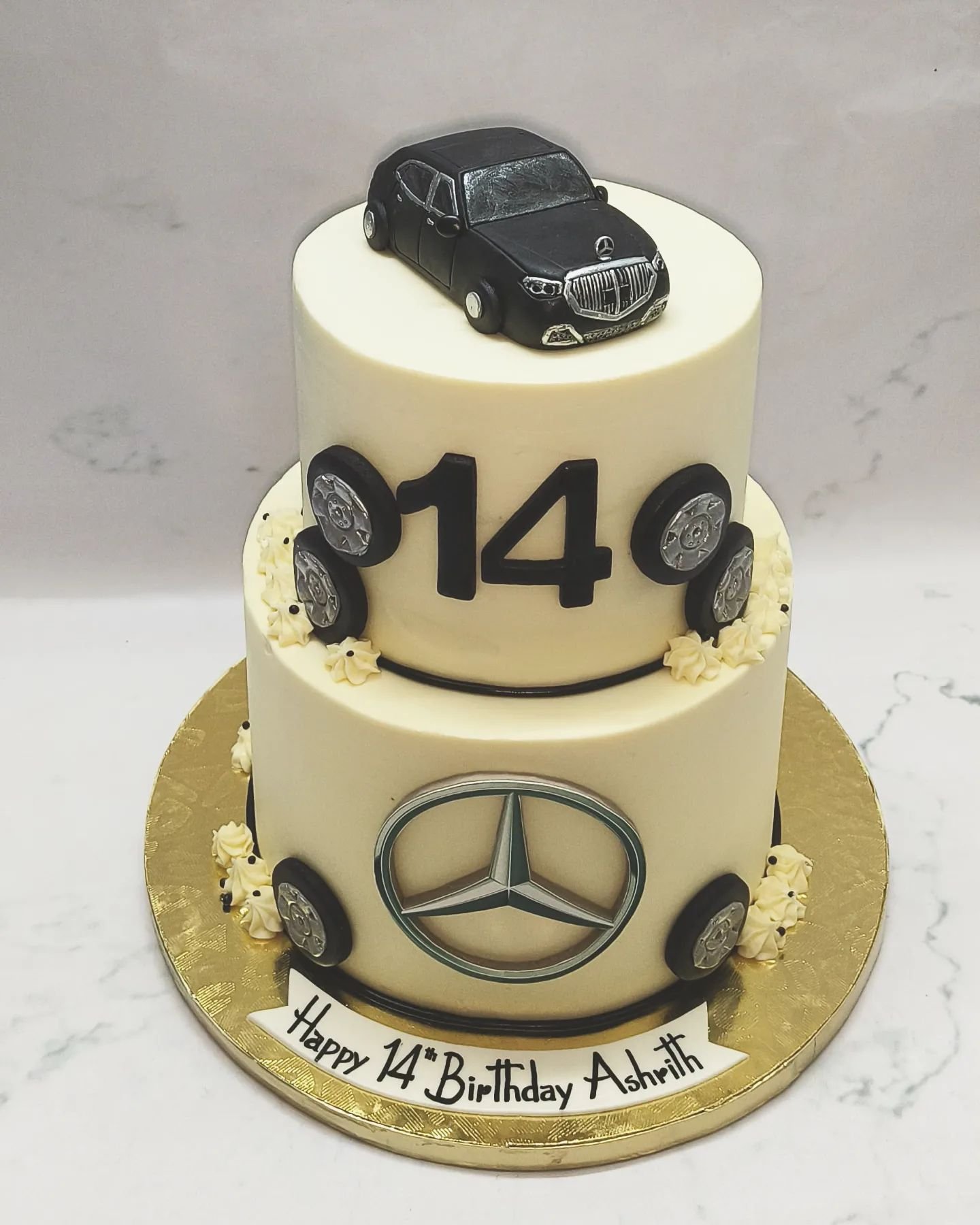 Mercedes themed two tier cake

[ customized theme cake, car theme cake, fourteenth birthday]