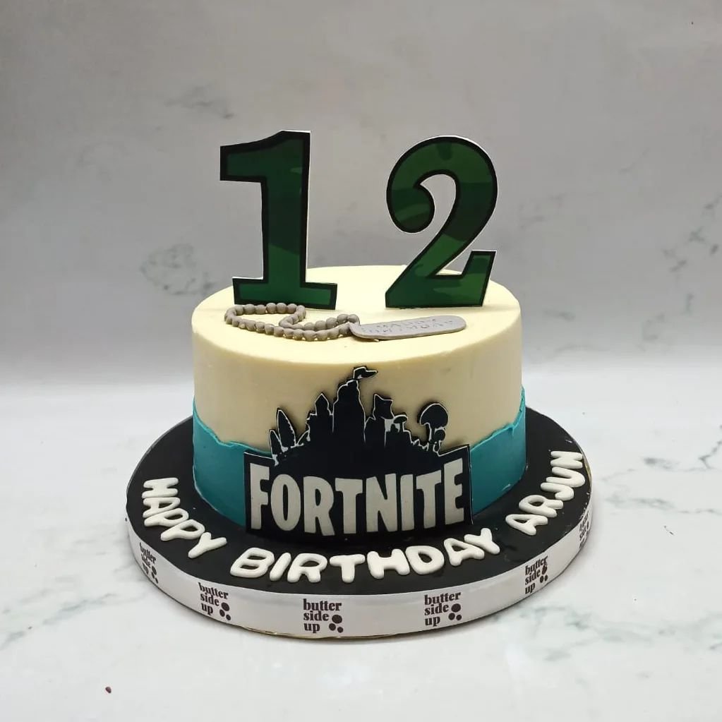 Fortnite themed cake

[ buttercream cake, customized cake bangalore]