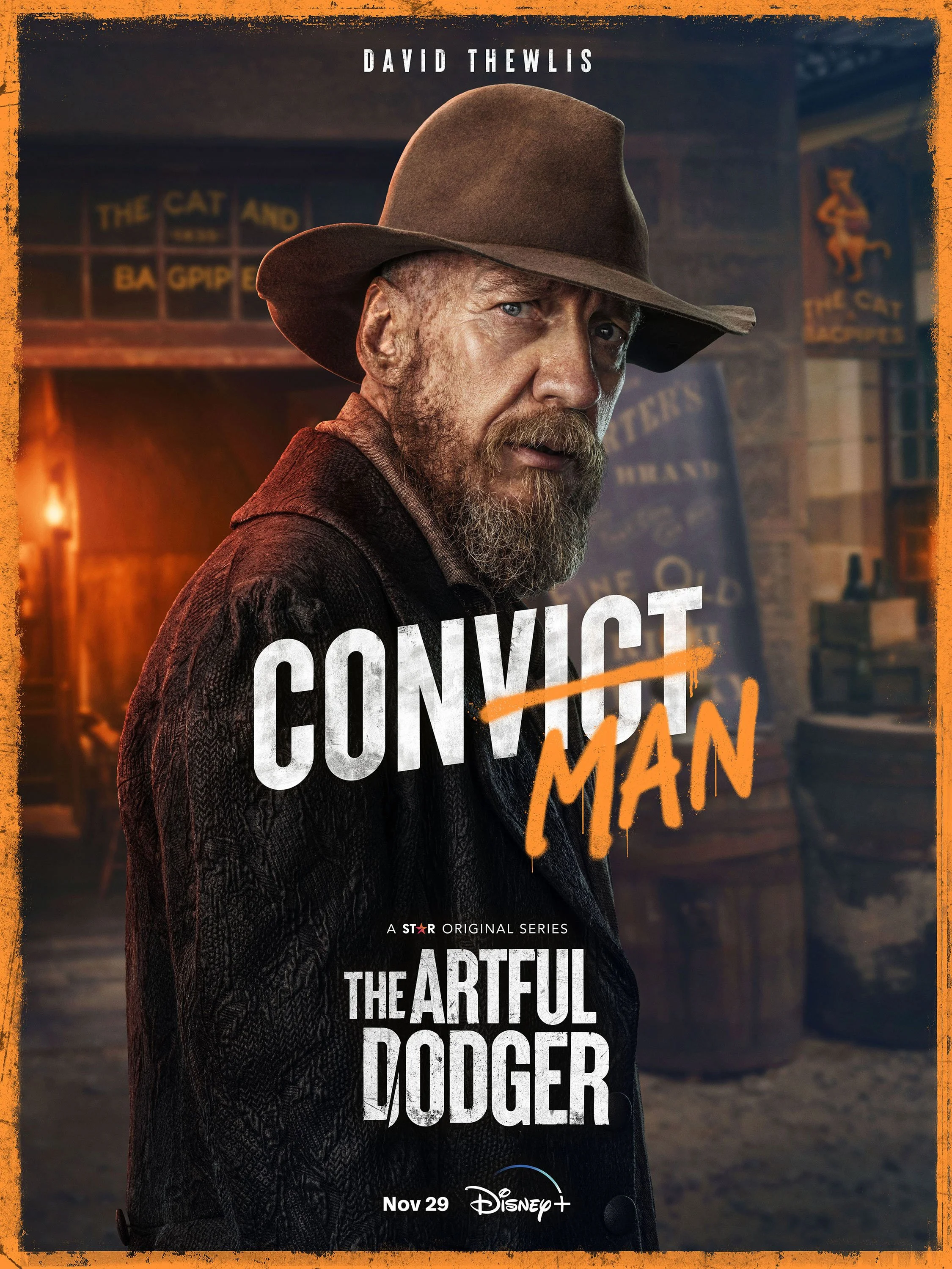 Promotional poster for series 'The Artful Dodger' featuring a man with a beard wearing a brown cowboy hat and dark clothing, standing in an old-fashioned town setting with wooden buildings and signage.