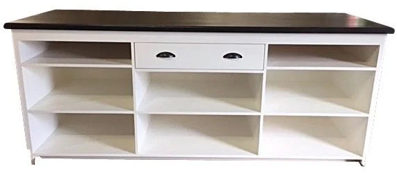 Cash wrap counter with drawers and shelves, rear view