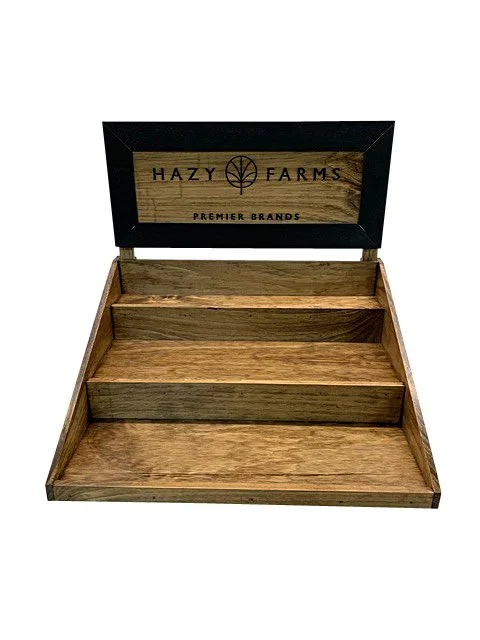 Stained tiered countertop display with framed header sign