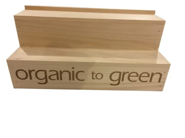 Pine countertop riser with etched logo front