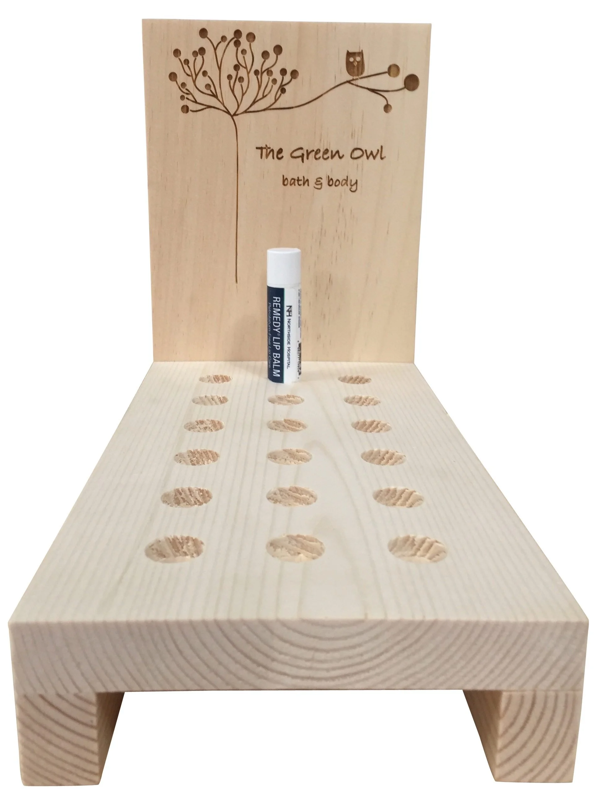 Lip balm display with routed holes and etched back panel