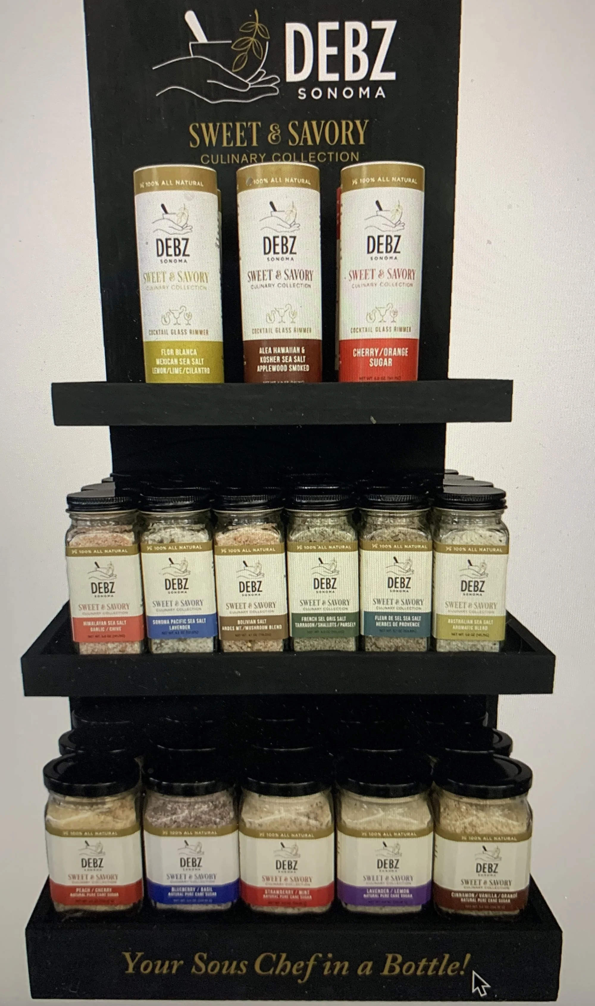 Black floating-shelf countertop merchandiser with printed header