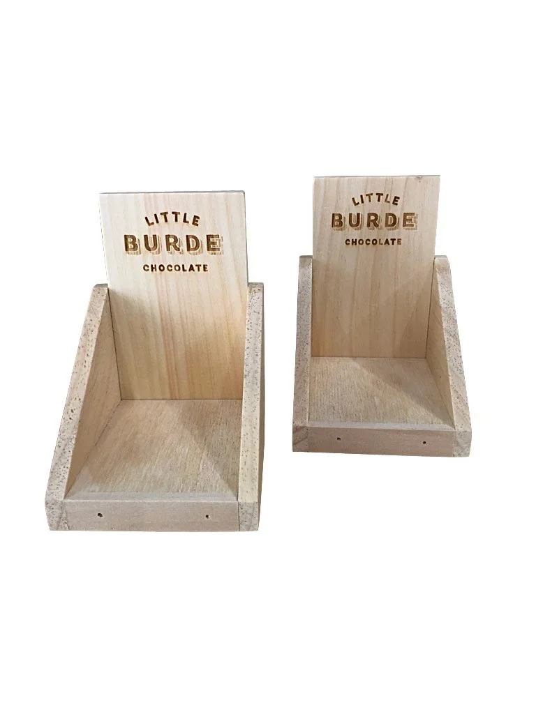 Small pine tray displays with laser-carved logos