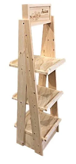 A-frame ladder merchandising display with angled shelves