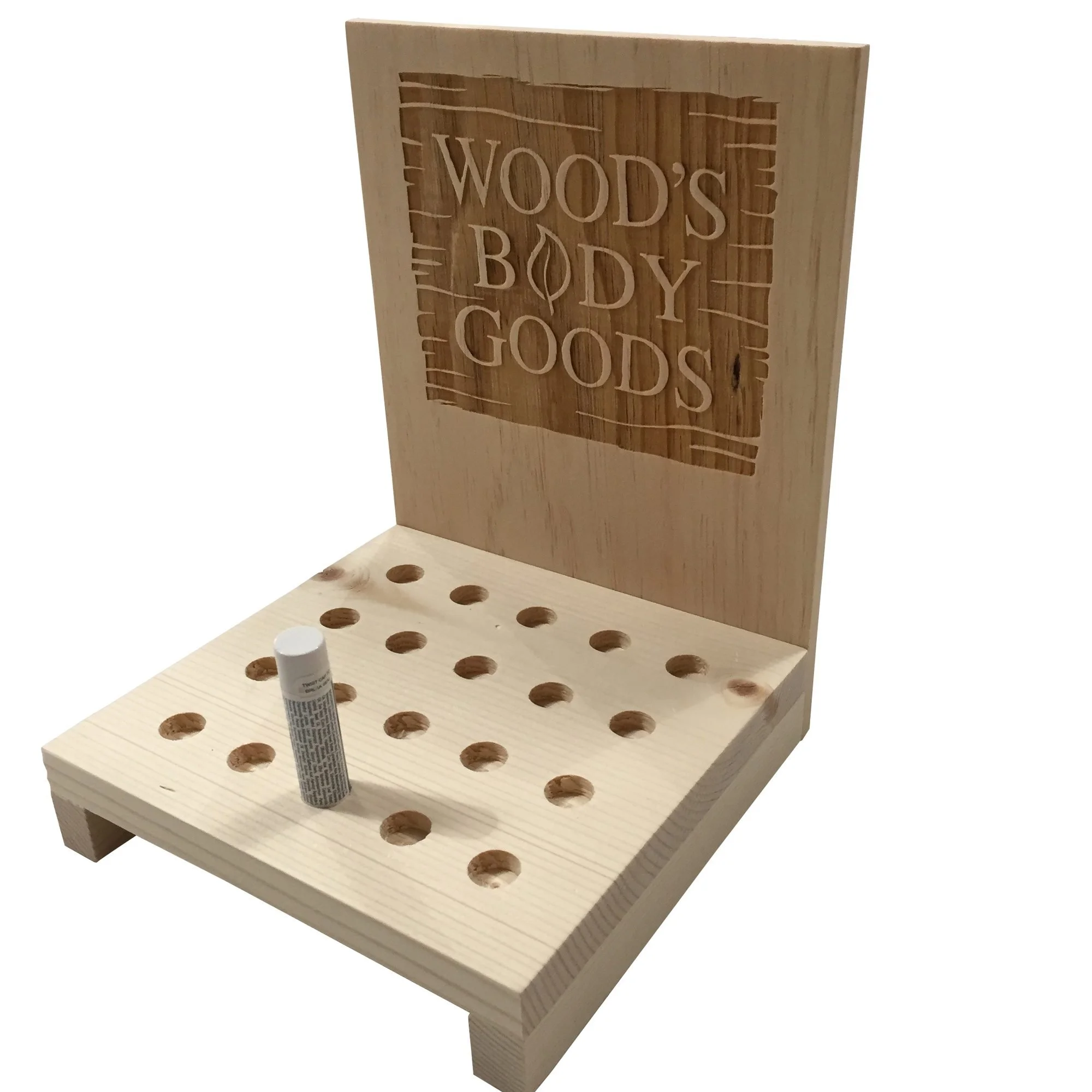 Pine lip balm display with routed holes and etched back panel