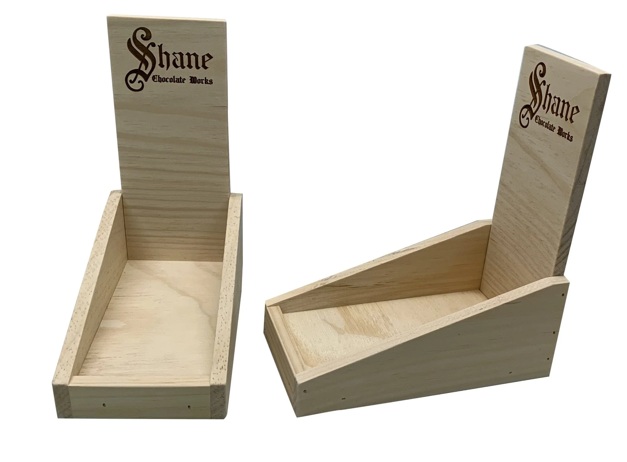 Angled pine tray displays with etched header panels