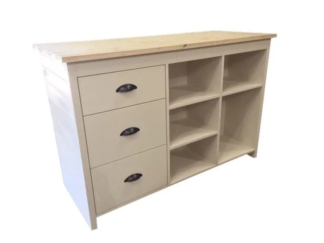 Cream cash wrap counter with drawers and open shelves, rear view