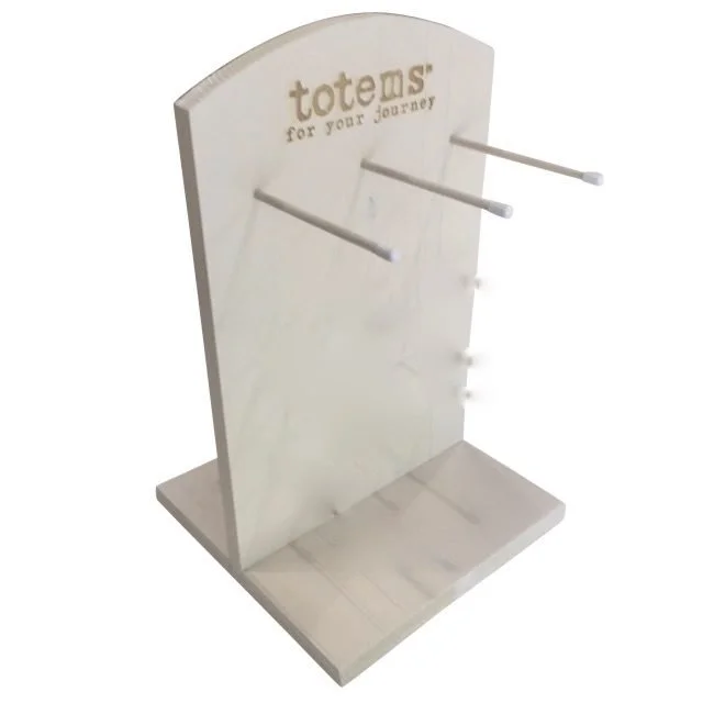 Pine countertop peg display with etched header