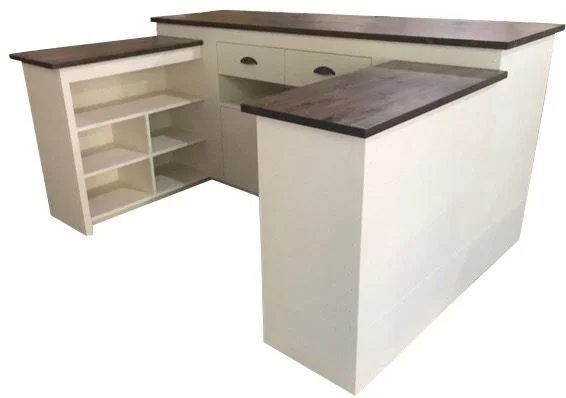 Small white U-shaped sales counter with storage drawers