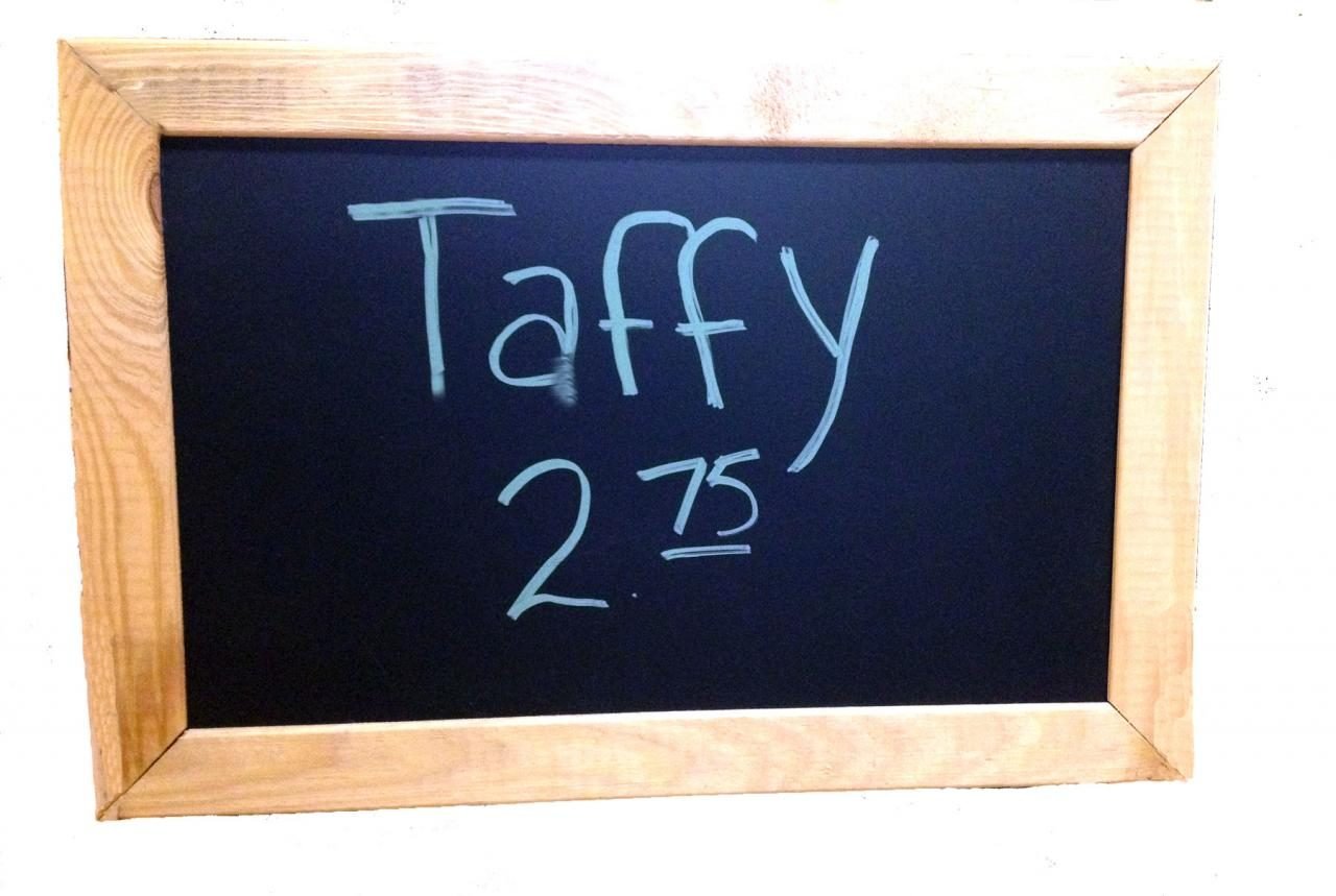 Wood-framed product pricing chalkboard